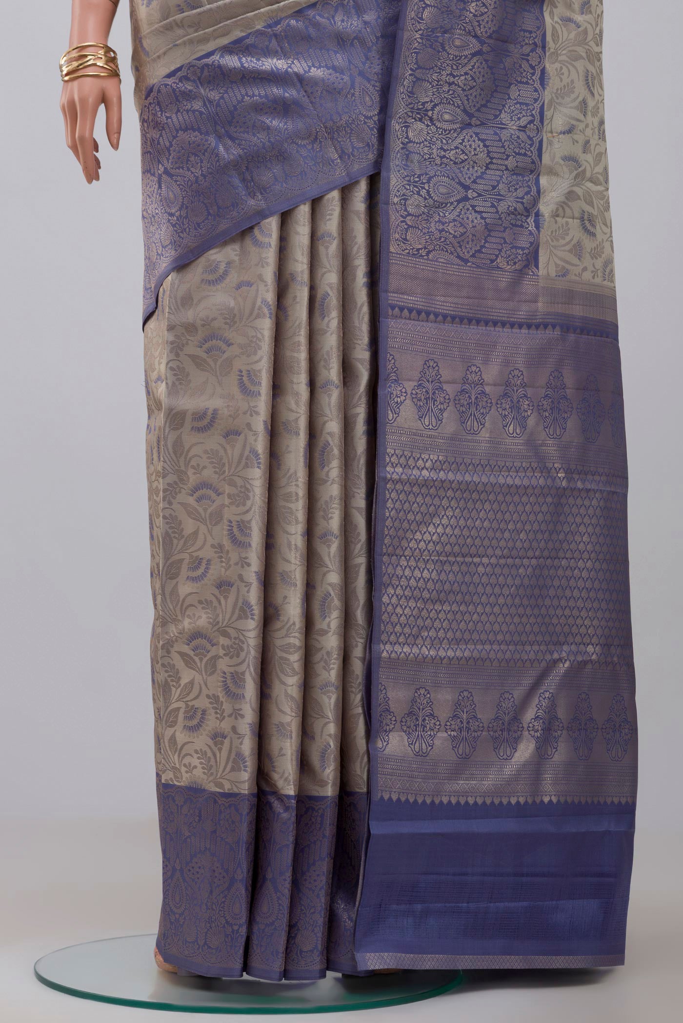 Pleats and pallu of Grey Kanchipuram Saree with Zari Brocade on the body and Fancy Border. 