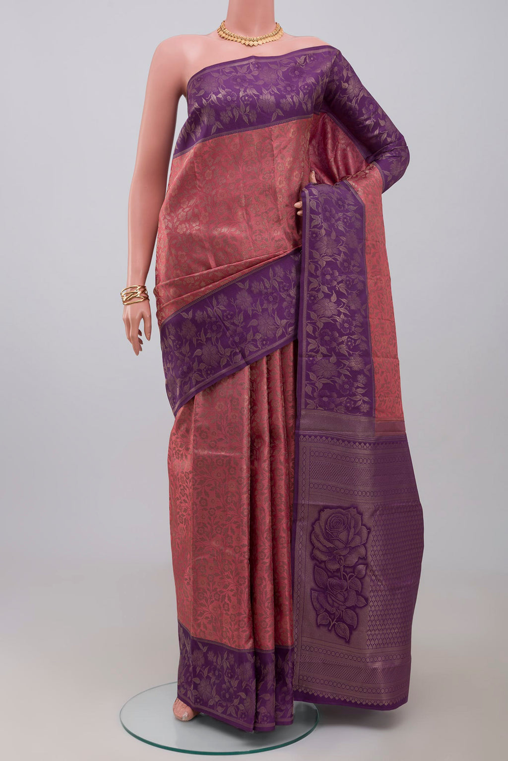 Pink Kanchipuram Silk Saree with Zari Brocade on the body and Fancy Border.  displayed on a mannequin