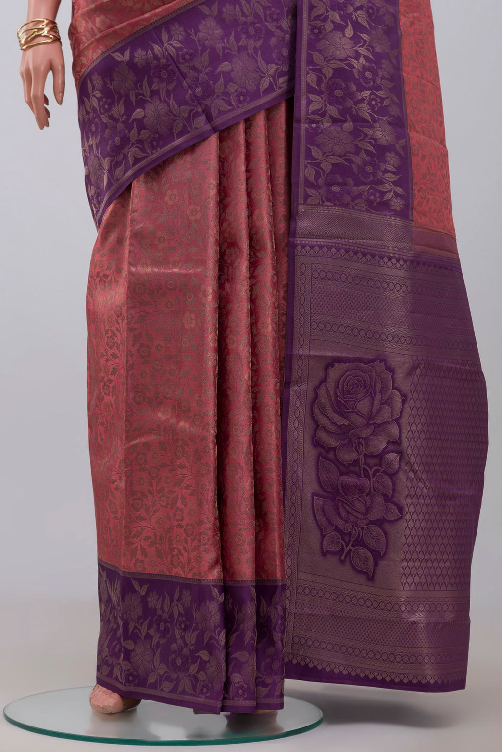 Pleats and pallu of Pink Kanchipuram Silk Saree with Zari Brocade on the body and Fancy Border. 