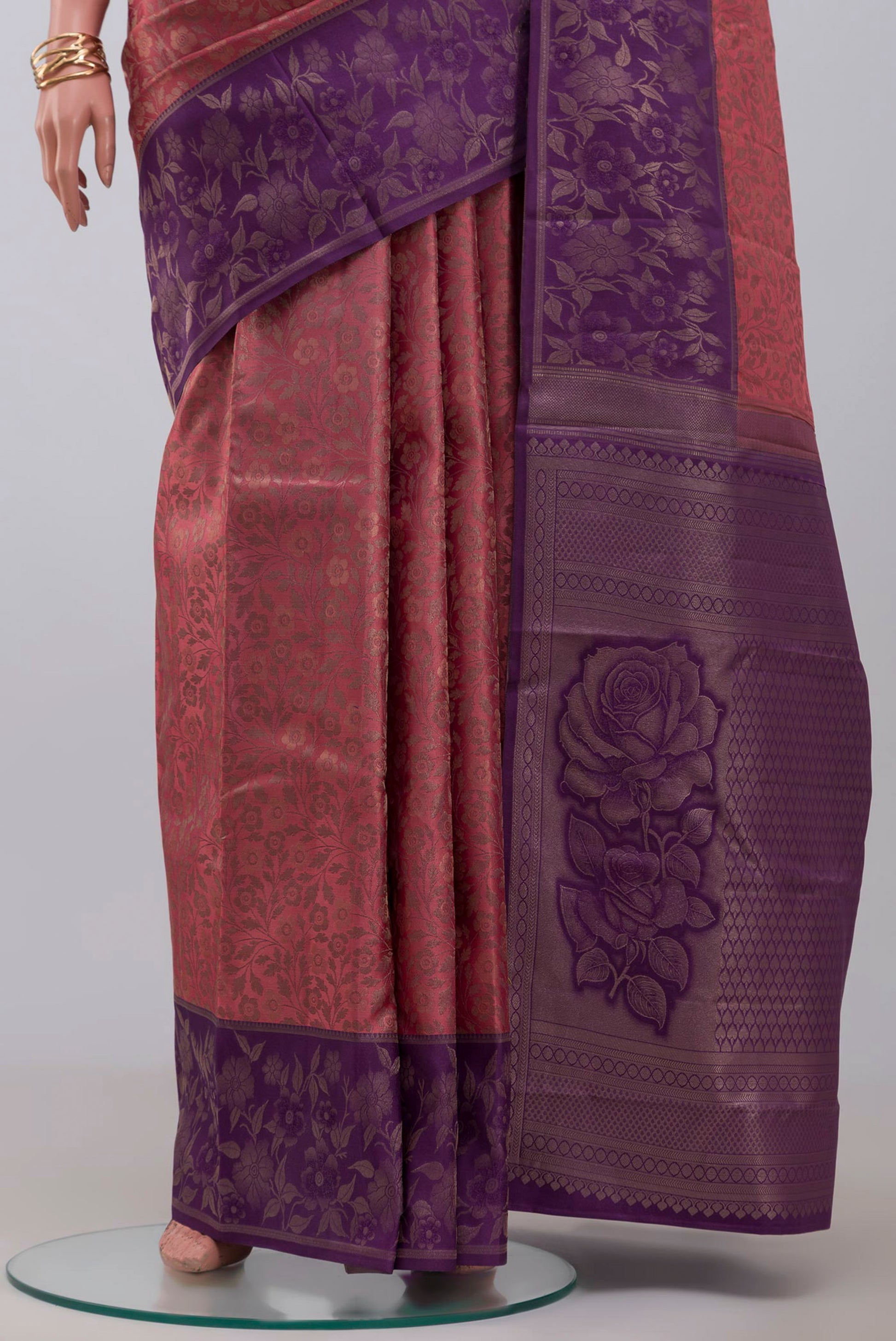 Pleats and pallu of Pink Kanchipuram Silk Saree with Zari Brocade on the body and Fancy Border. 