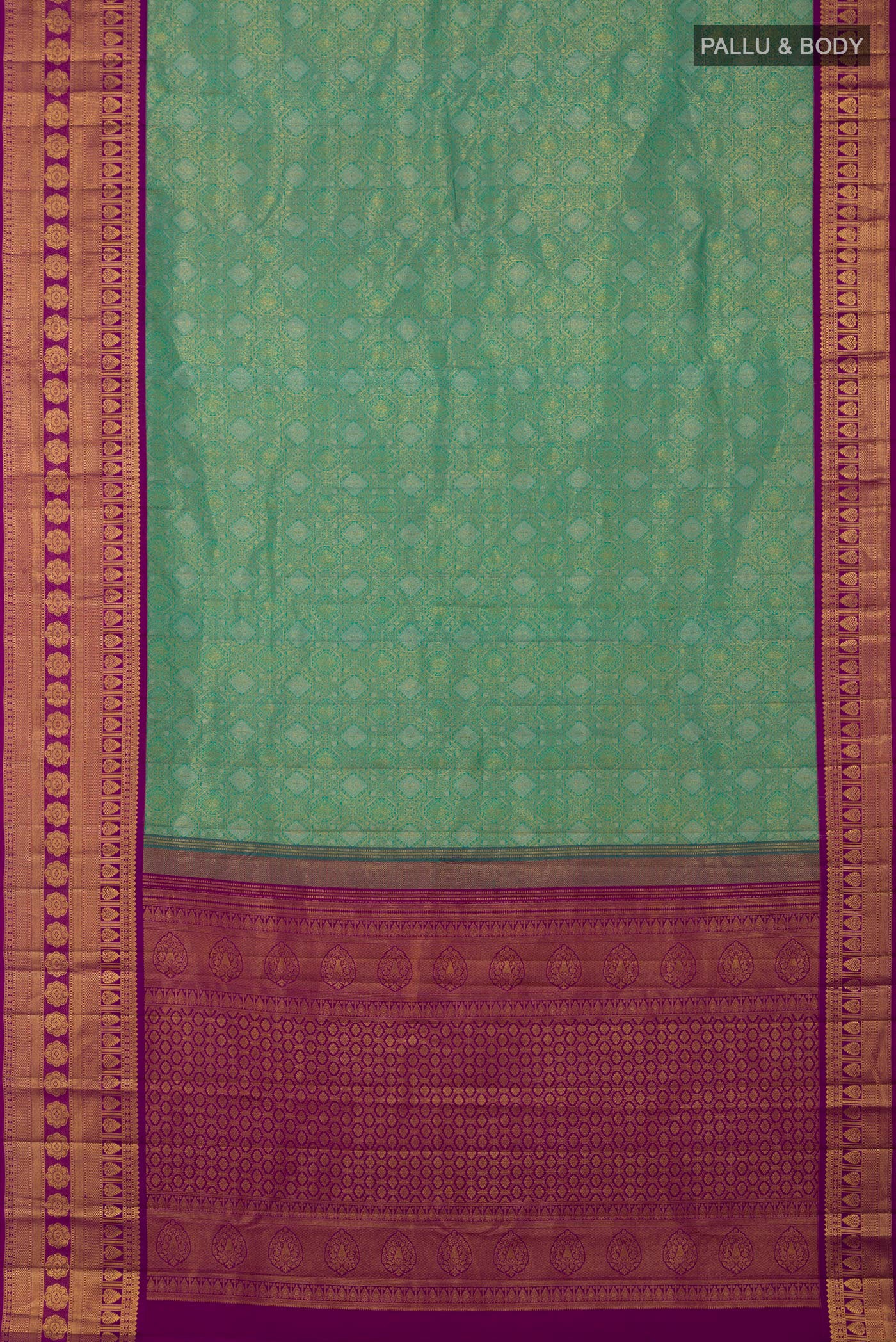 Flat view of Green Kanchipuram Silk Saree with Zari Brocade on the body and Zari Border. 