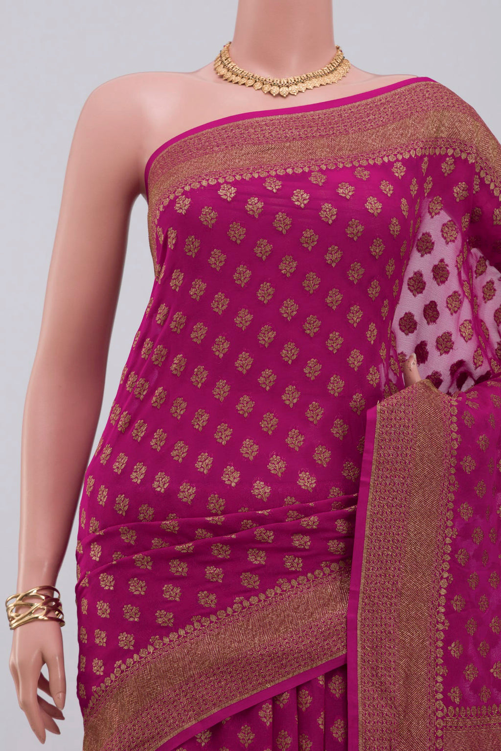 Border image of Pink Georgette Saree with Fancy on the body and Fancy Border. 