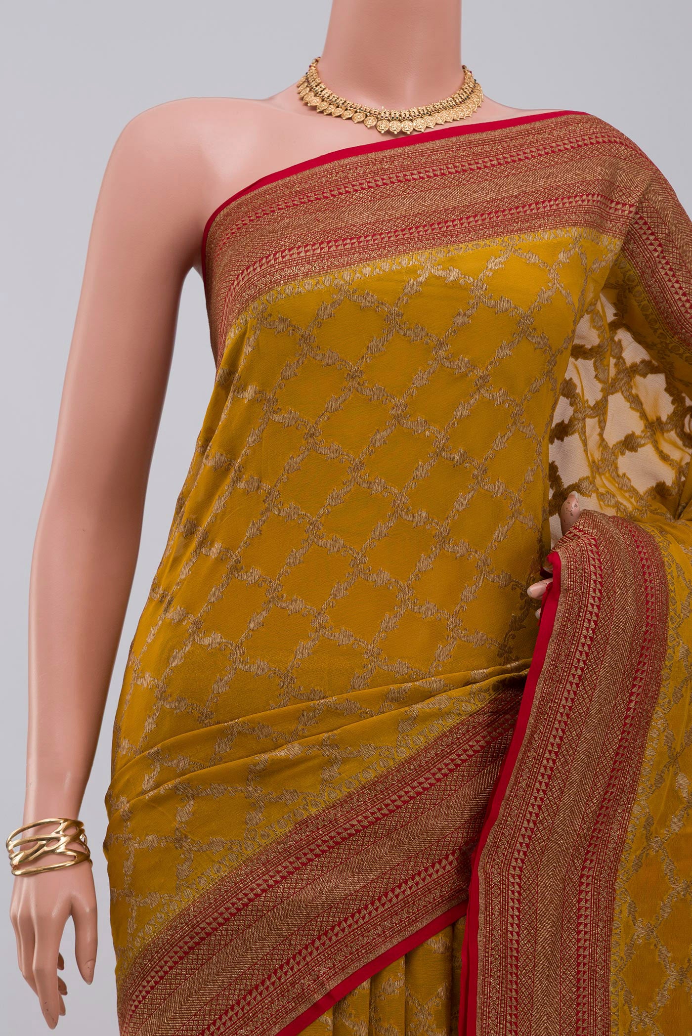 Border image of Yellow Georgette Saree with Fancy on the body and Zari Border. 