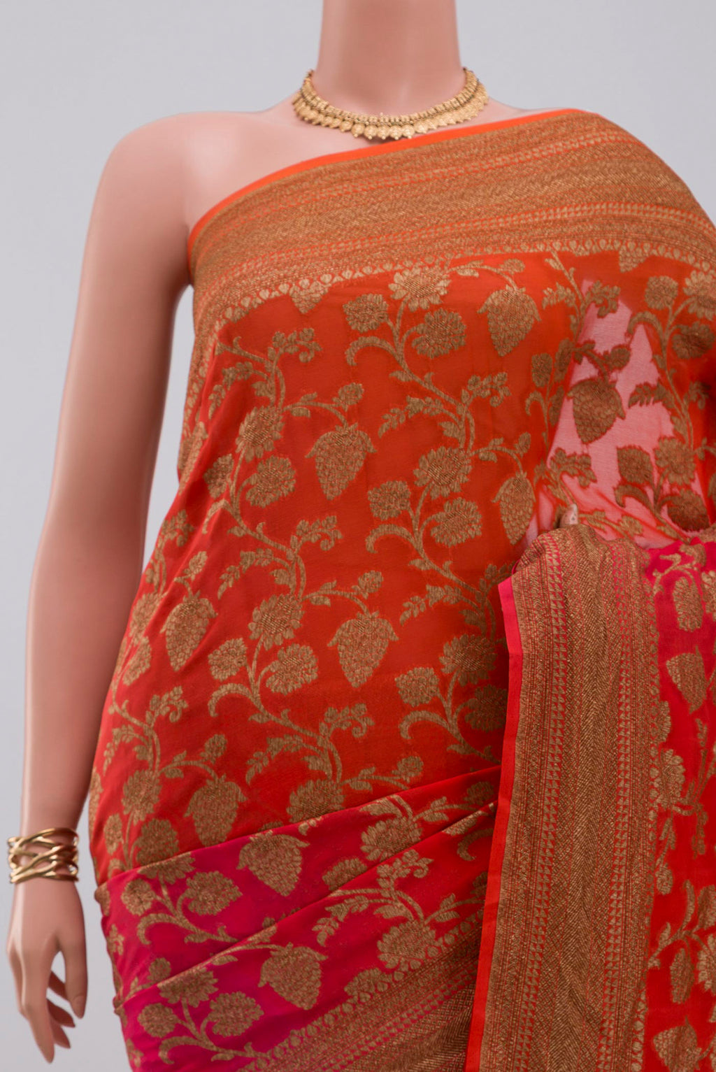 Border image of Orange Georgette Saree with Fancy on the body and Fancy Border. 