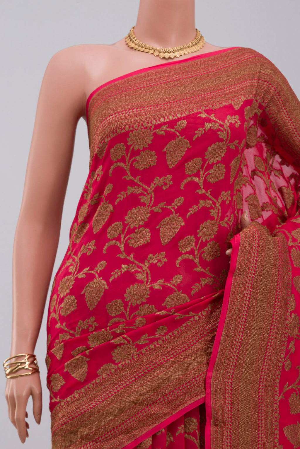 Border image of Pink Georgette Saree with Fancy on the body and Zari Border. 