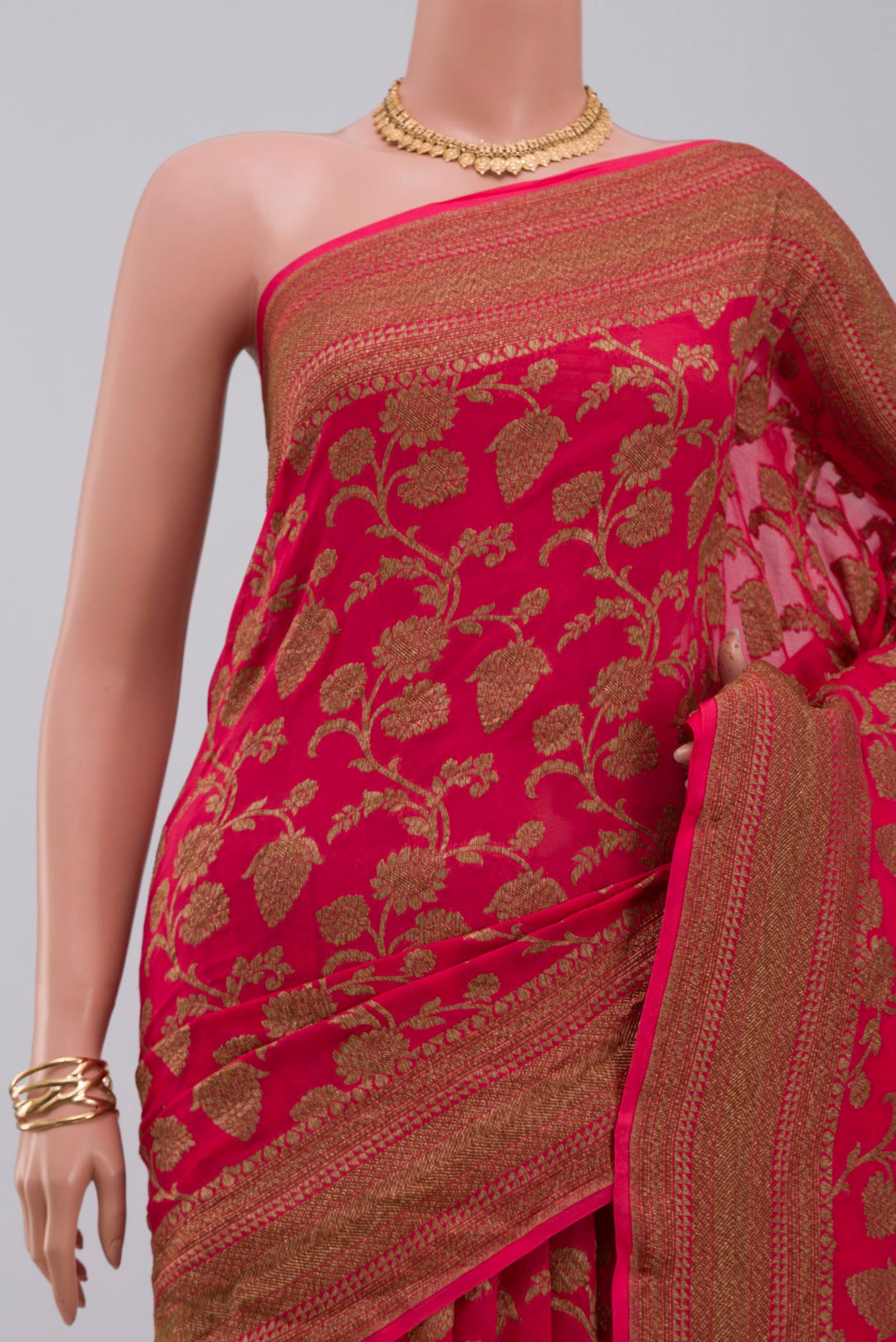 Border image of Pink Georgette Saree with Fancy on the body and Zari Border. 