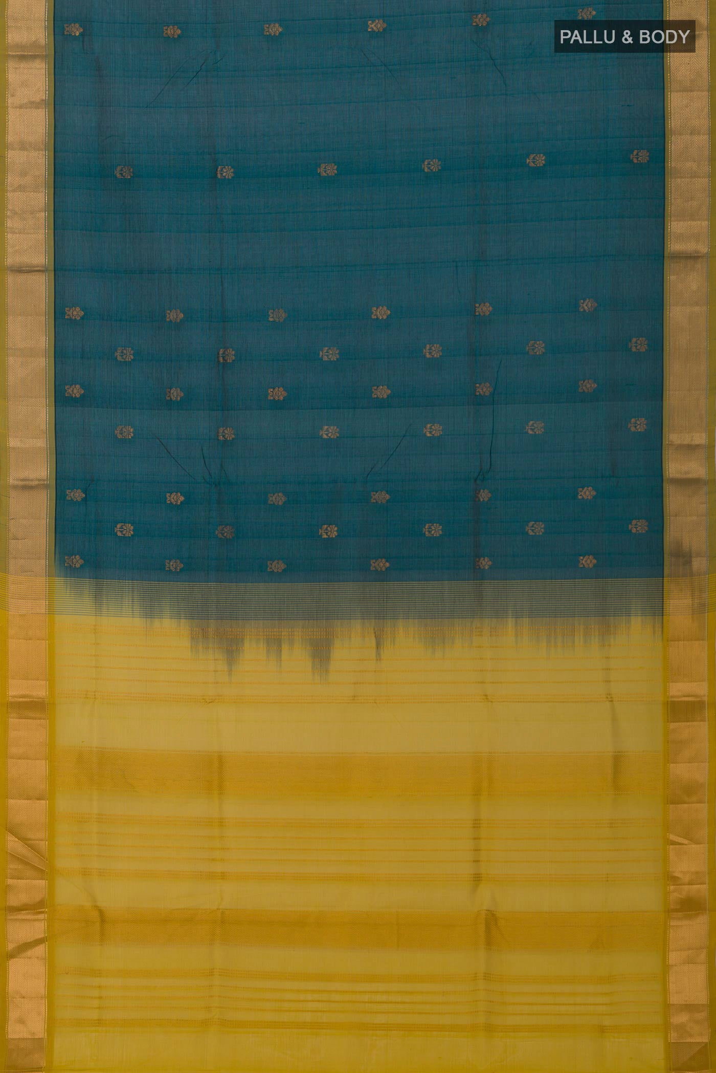 Flat view of Bottle Green Silk Cotton Saree with Zari Butta on the body and Zari Border. 