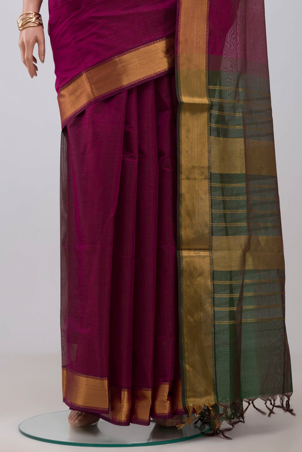 Pleats and pallu of Magenta Coimbatore Silk Cotton Saree with Stripes on the body and Zari Border. 