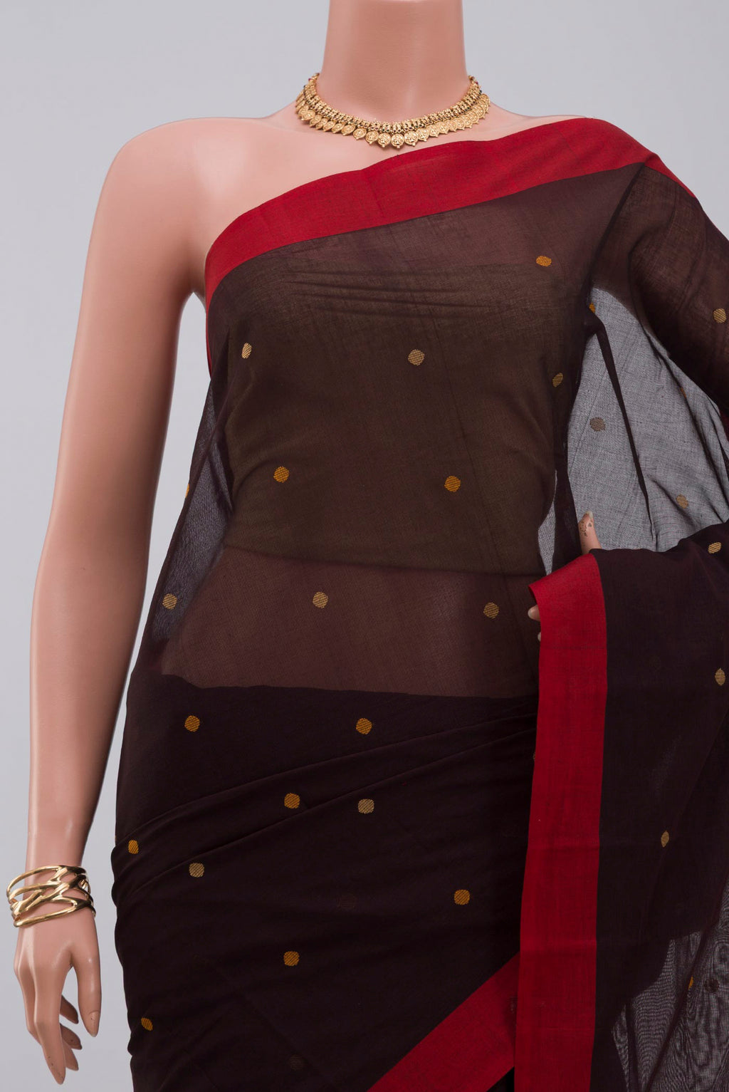 Border image of Brown Kanchi Cotton Saree with Thread Butta on the body and Plain Border. 