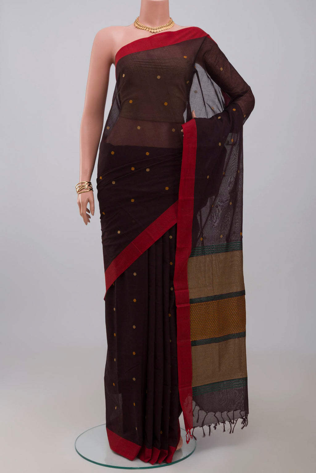 Brown Kanchi Cotton Saree with Thread Butta on the body and Plain Border.  displayed on a mannequin