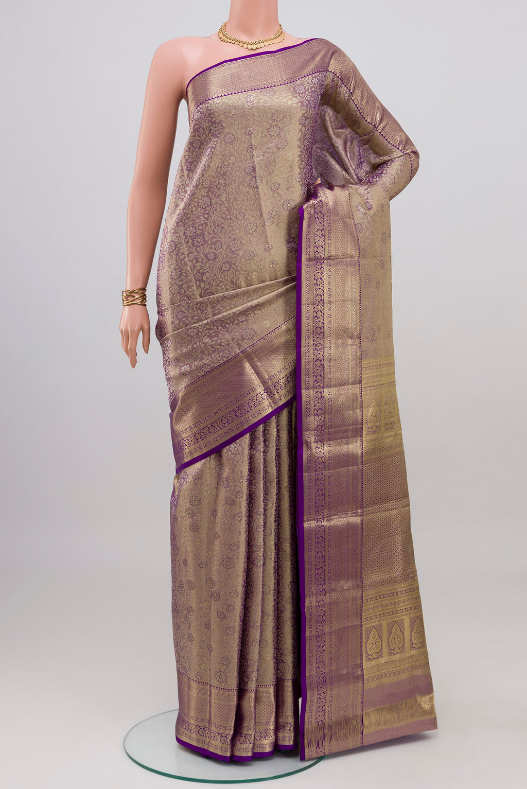 Violet Dual Tone Kanchipuram Tissue Silk Saree with Zari Brocade on the body and Zari Border.  displayed on a mannequin