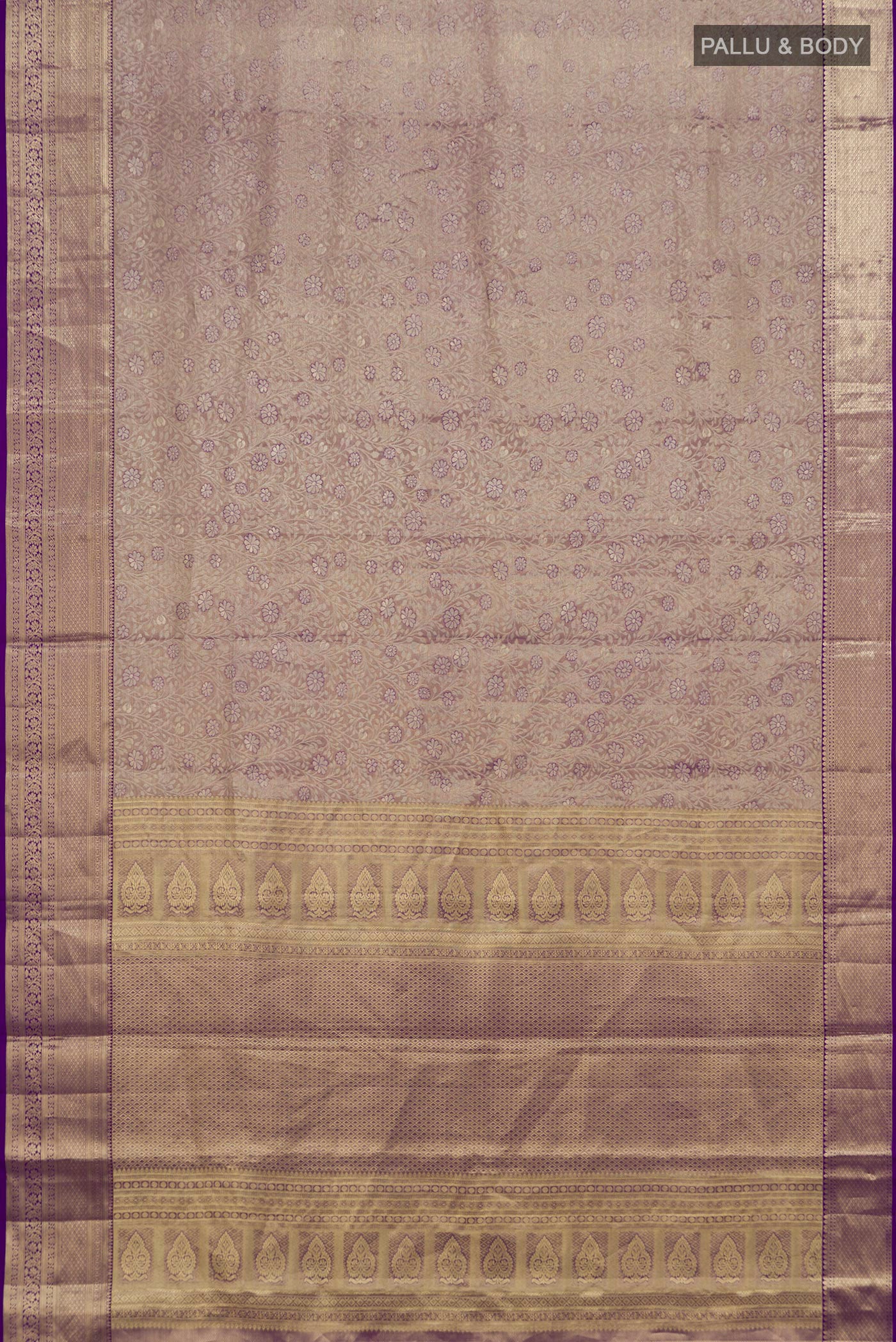 Flat view of Violet Dual Tone Kanchipuram Tissue Silk Saree with Zari Brocade on the body and Zari Border. 