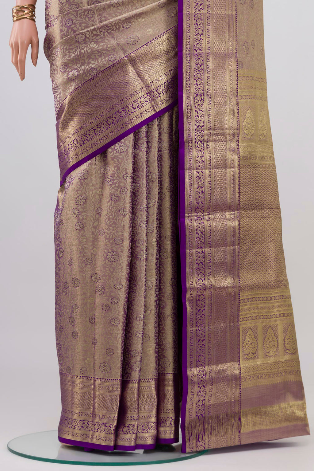 Pleats and pallu of Violet Dual Tone Kanchipuram Tissue Silk Saree with Zari Brocade on the body and Zari Border. 