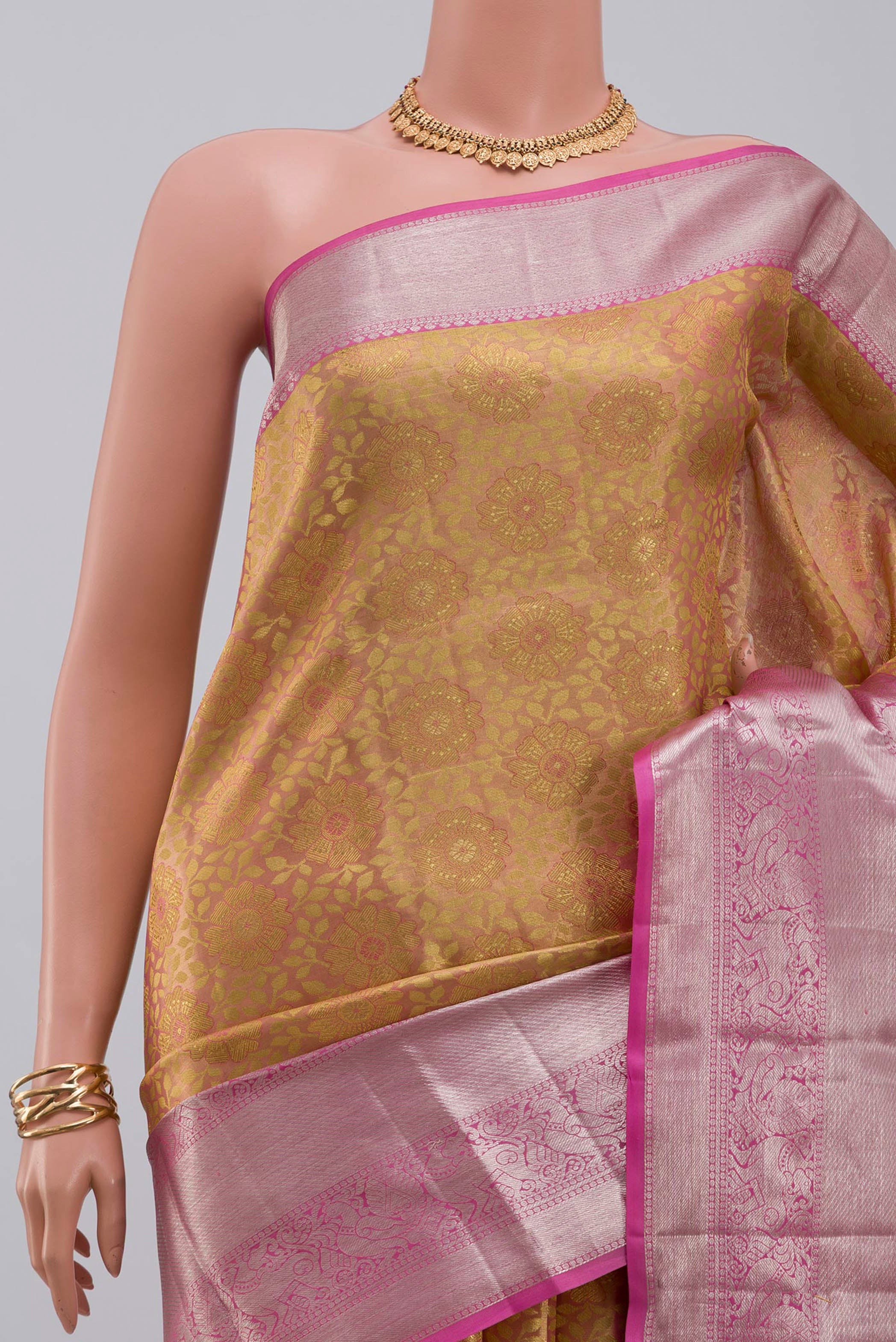 Border image of Golden Peach Kanchipuram Silk Saree with Zari Brocade on the body and Zari Border. 