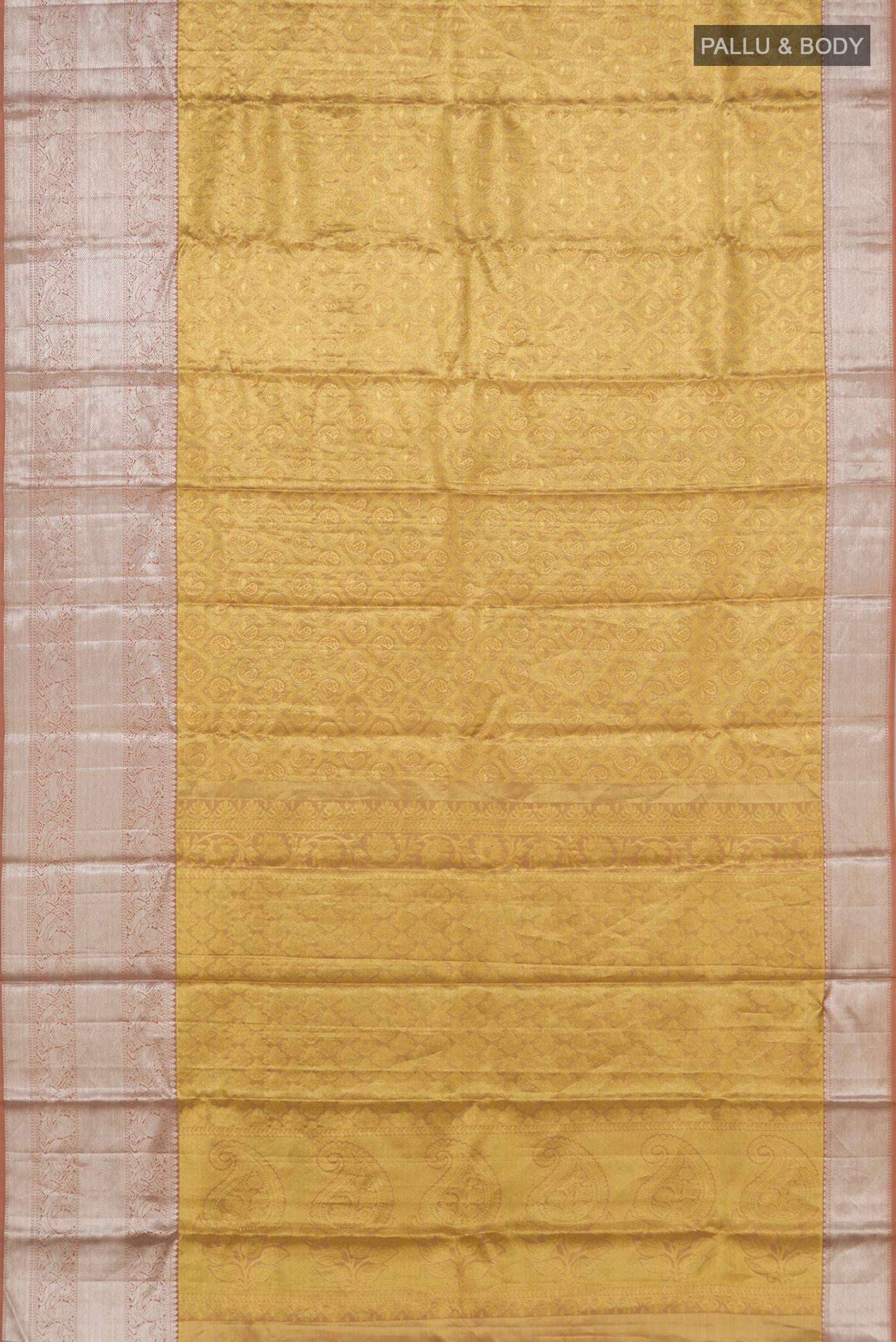 Flat view of Golden Kanchipuram Tissue Silk Saree with Zari Brocade on the body and Zari Border. 