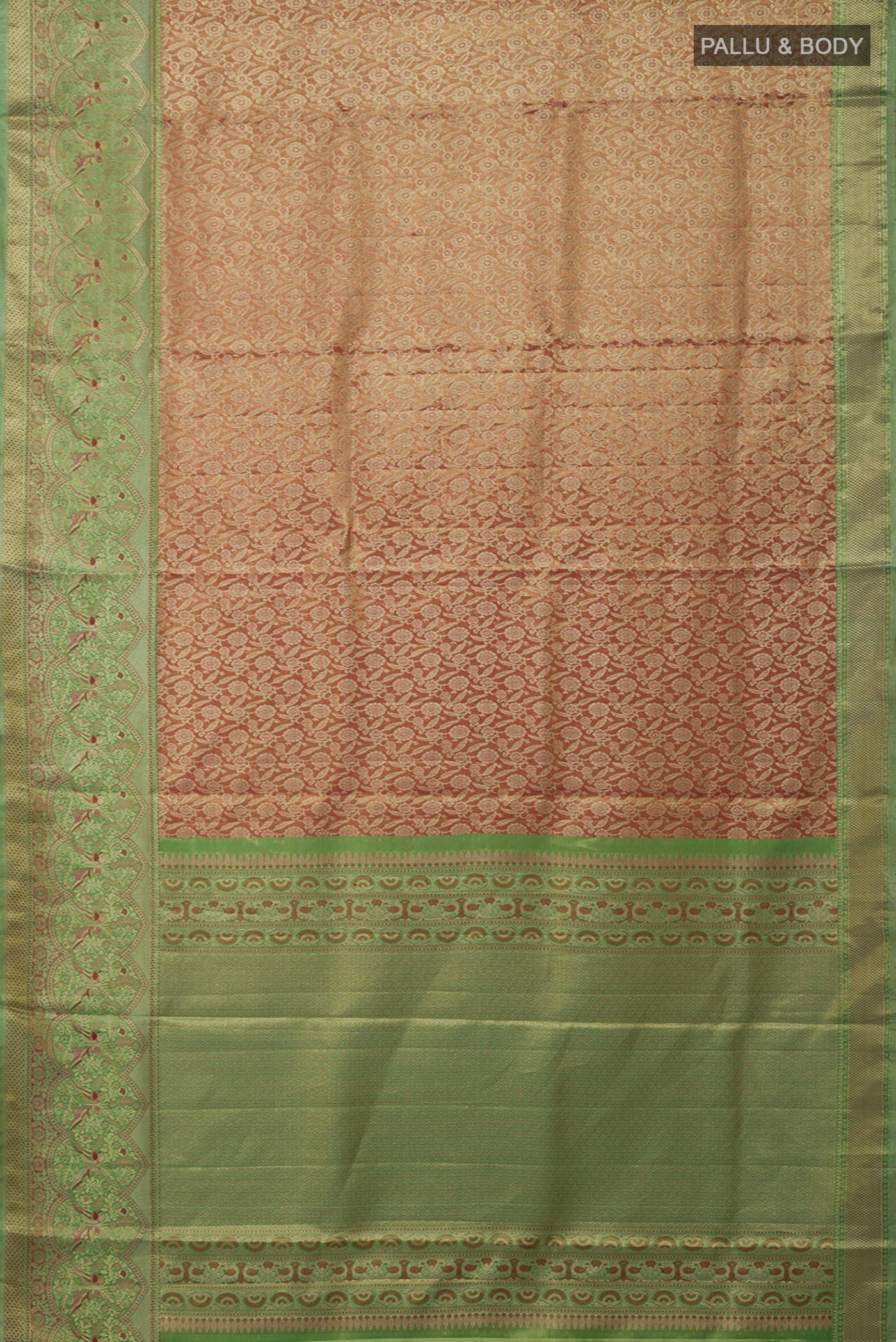Flat view of Peach Kanchipuram Tissue Silk Saree with Zari Brocade on the body and Fancy Border. 