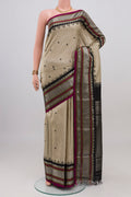 Cream Gadwal Silk Saree with Checked design on the body and Zari Border.  displayed on a mannequin