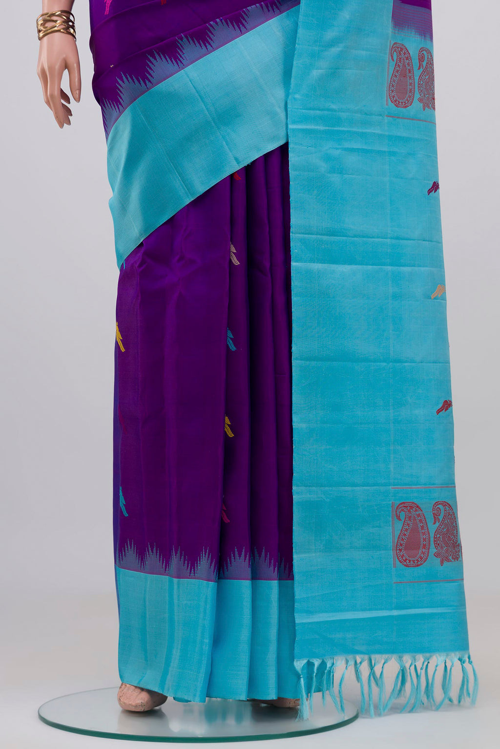 Pleats and pallu of Purple Gadwal Silk Saree with Thread Butta on the body and Temple Border. 