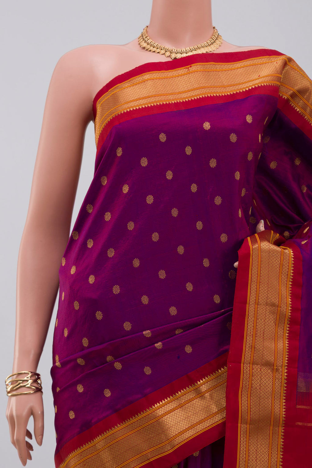 Border image of Purple Gadwal Silk Saree with Zari Butta on the body and Zari Border. 