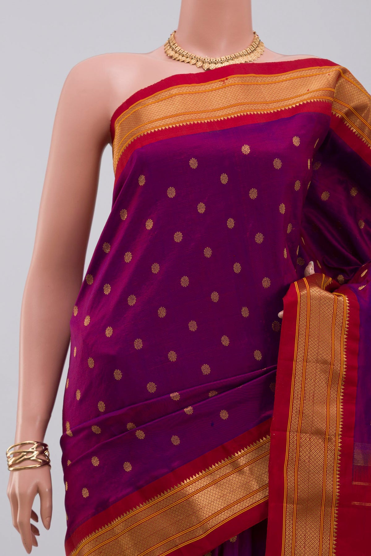 Border image of Purple Gadwal Silk Saree with Zari Butta on the body and Zari Border. 