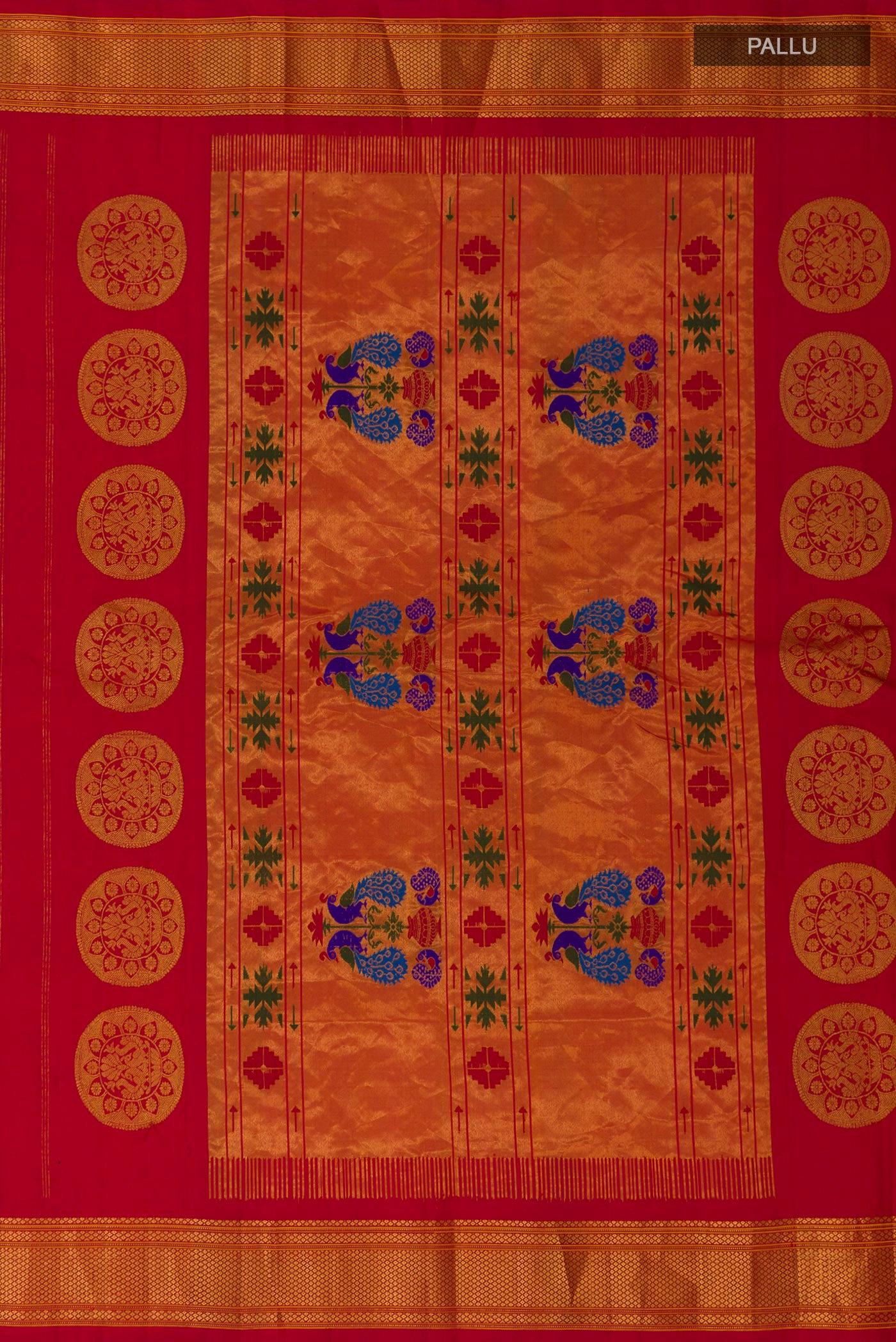 Close up image of the pallu of Red Gadwal Silk Saree with Zari Butta on the body and Zari Border. 