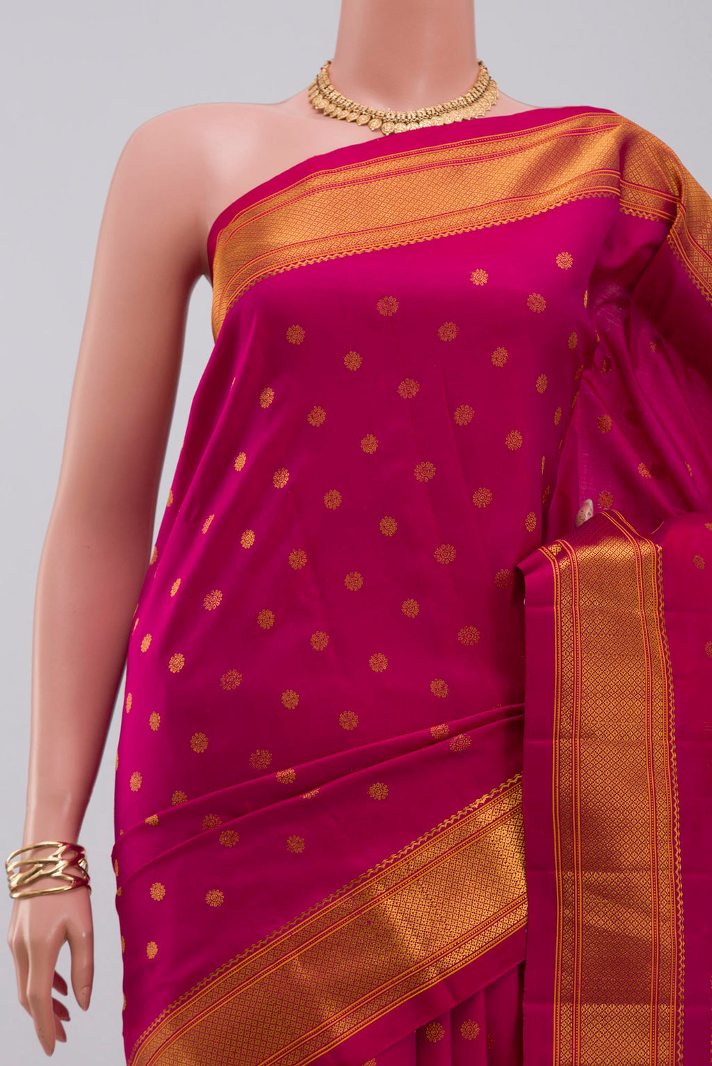 Border image of Pink Gadwal Silk Saree with Zari Butta on the body and Zari Border. 