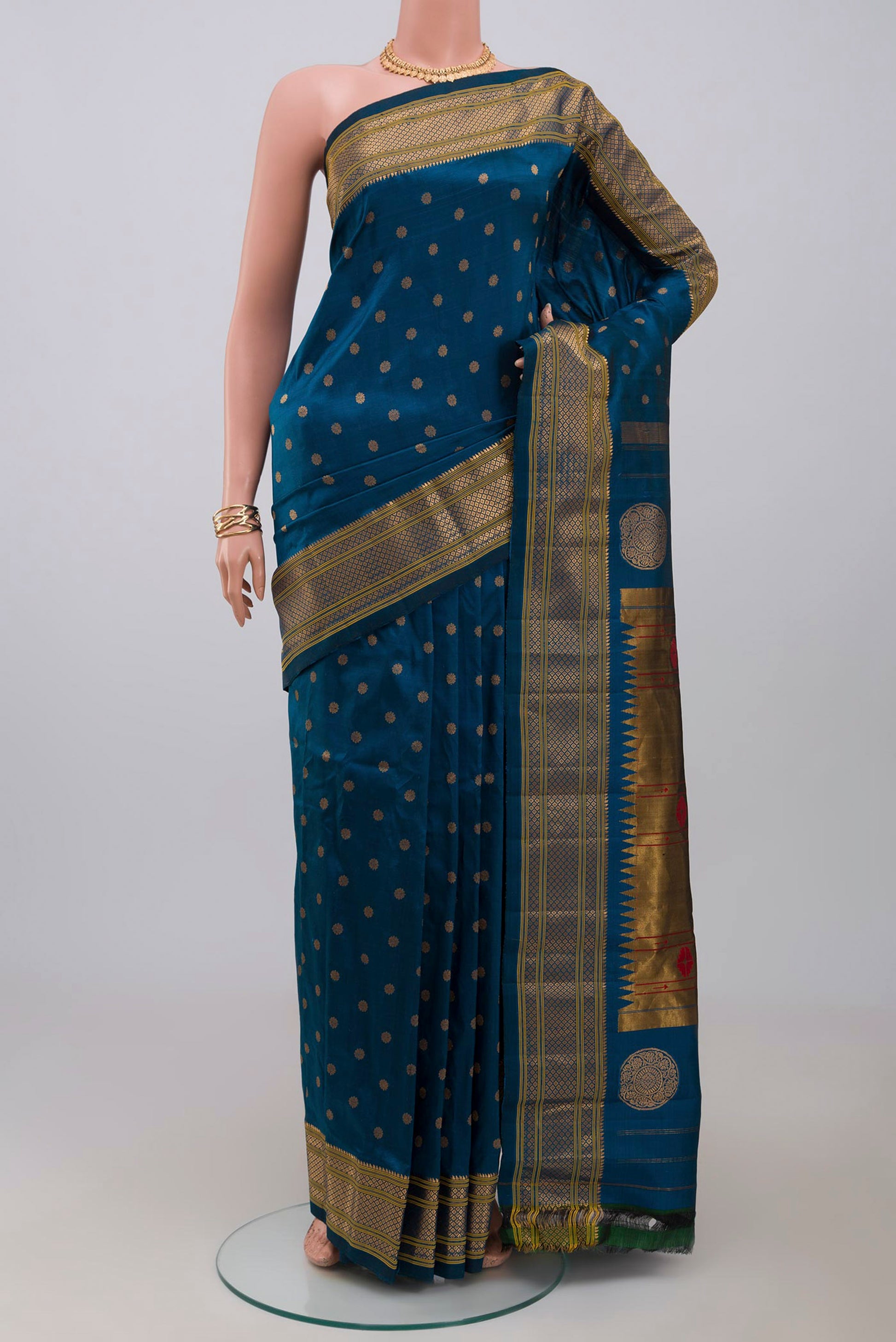 Blue Gadwal Silk Saree with Zari Butta on the body and Zari Border.  displayed on a mannequin