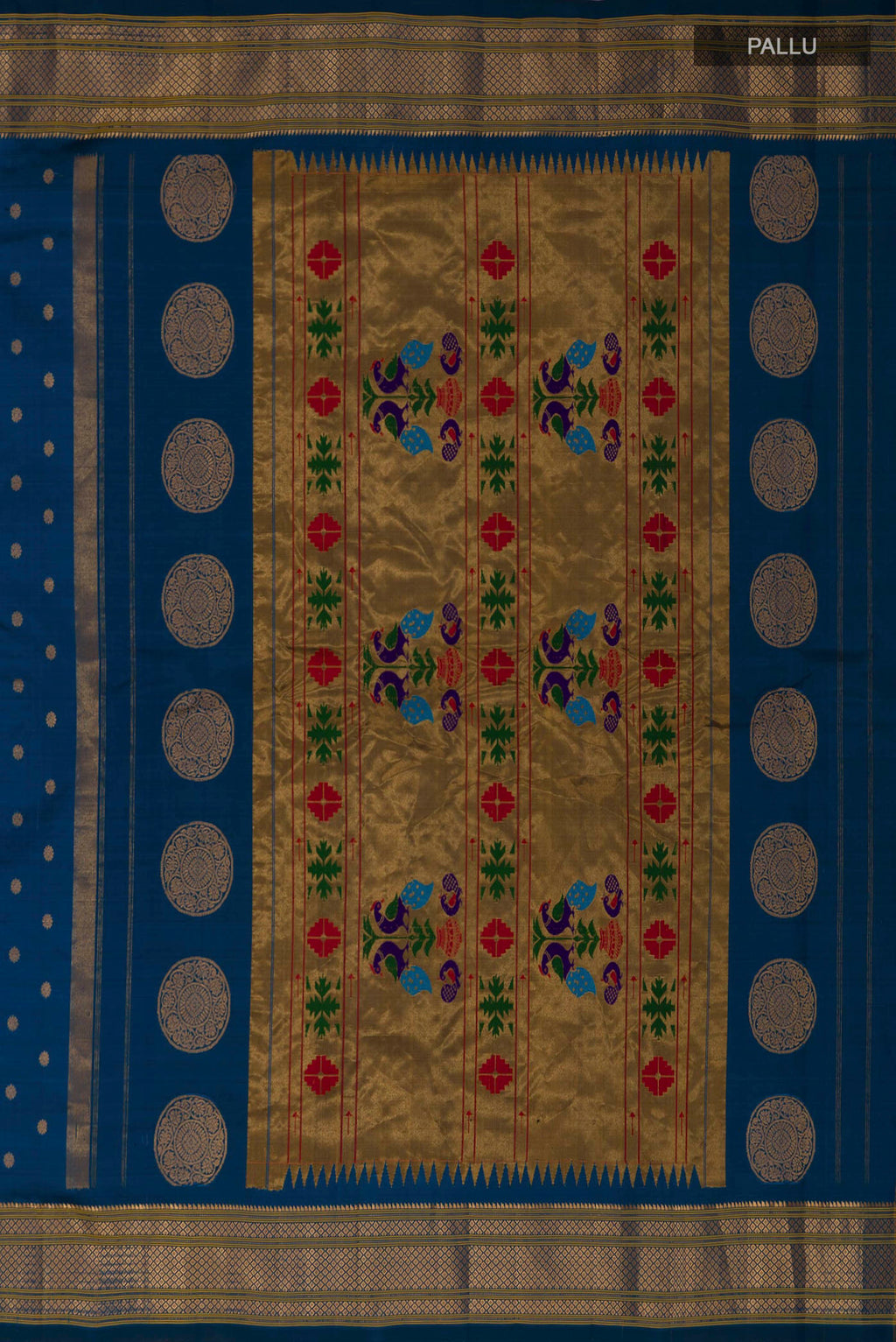 Close up image of the pallu of Blue Gadwal Silk Saree with Zari Butta on the body and Zari Border. 