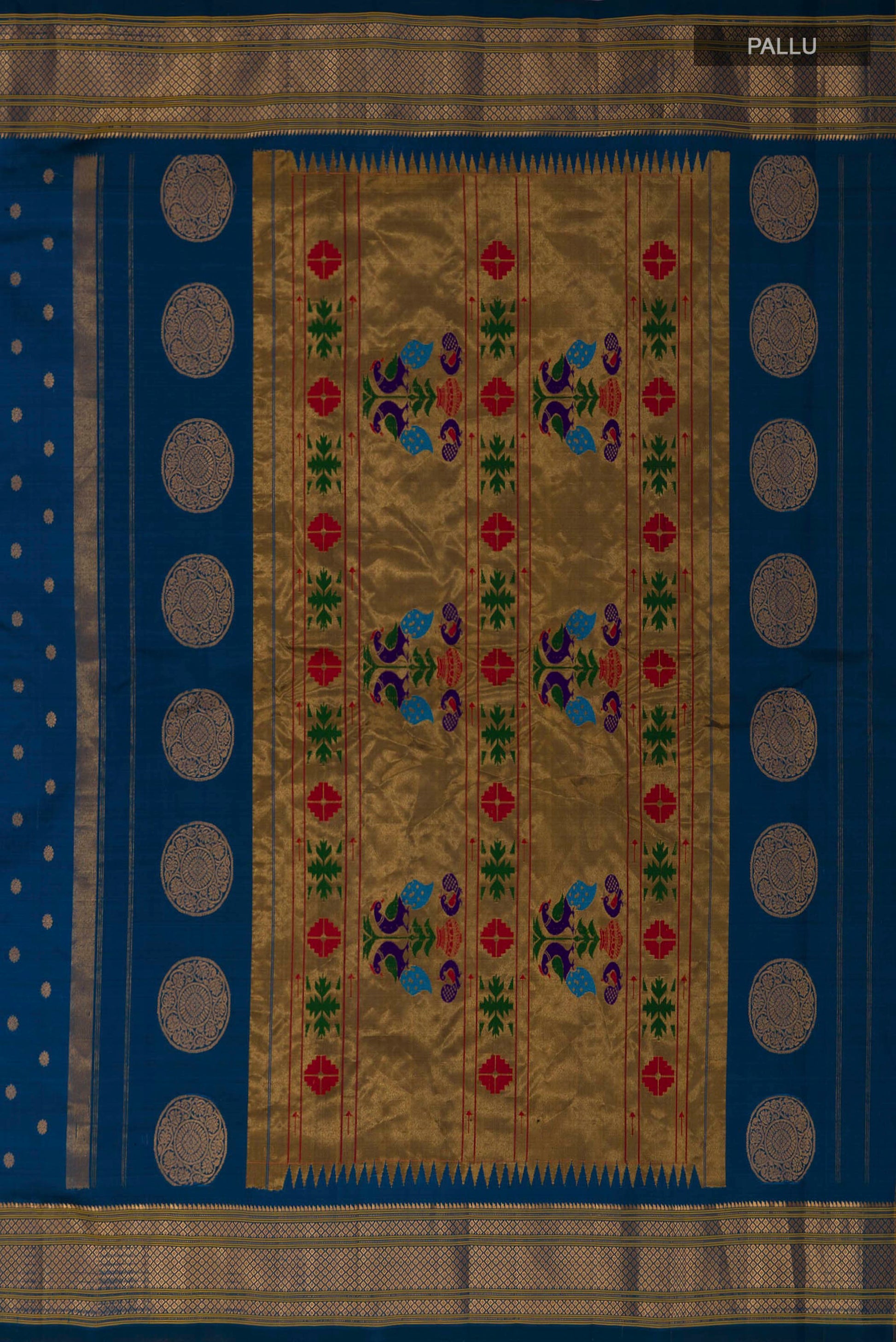 Close up image of the pallu of Blue Gadwal Silk Saree with Zari Butta on the body and Zari Border. 