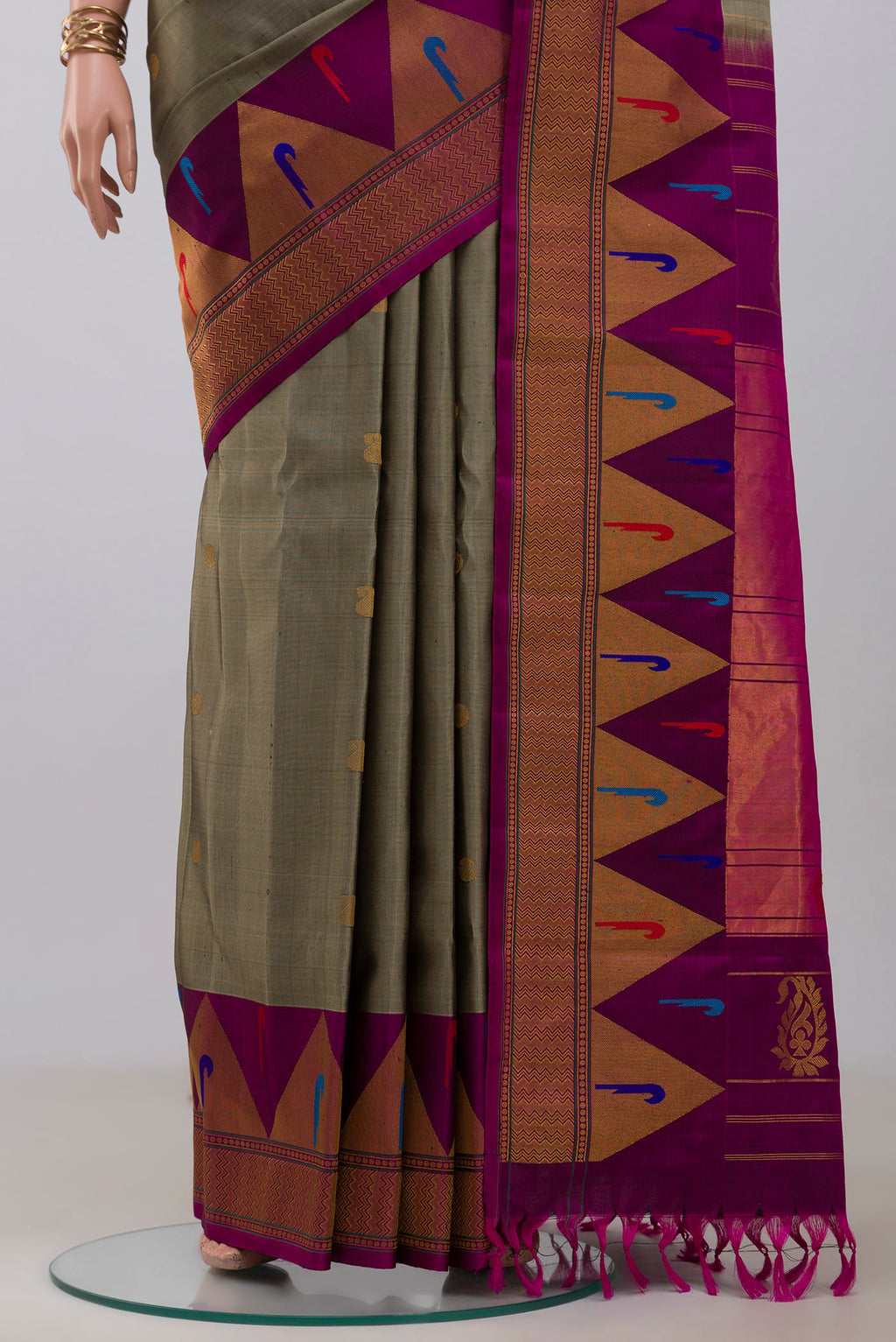 Pleats and pallu of Grey Gadwal Silk Saree with Zari Butta on the body and Fancy Border. 