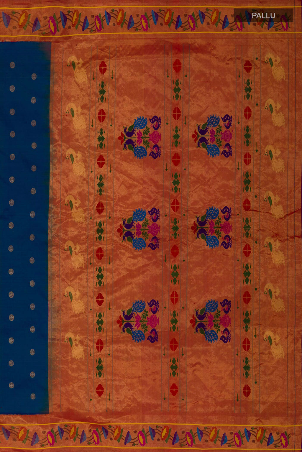 Close up image of the pallu of Blue Gadwal Silk Saree with Zari Butta on the body and Paithani Border. 