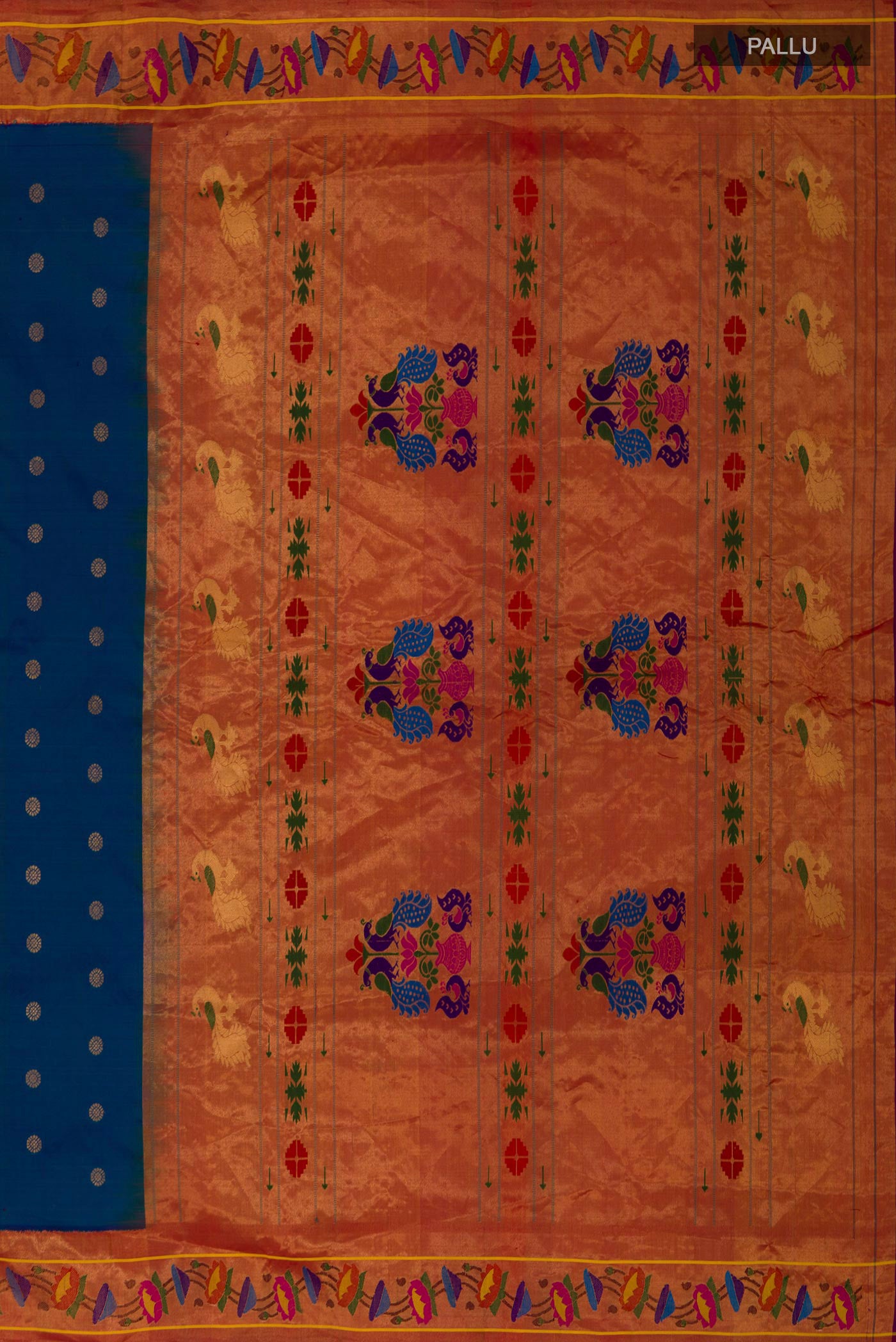 Close up image of the pallu of Blue Gadwal Silk Saree with Zari Butta on the body and Paithani Border. 