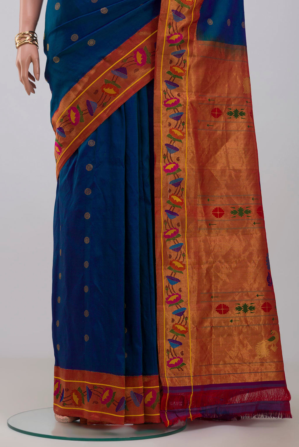 Pleats and pallu of Blue Gadwal Silk Saree with Zari Butta on the body and Paithani Border. 