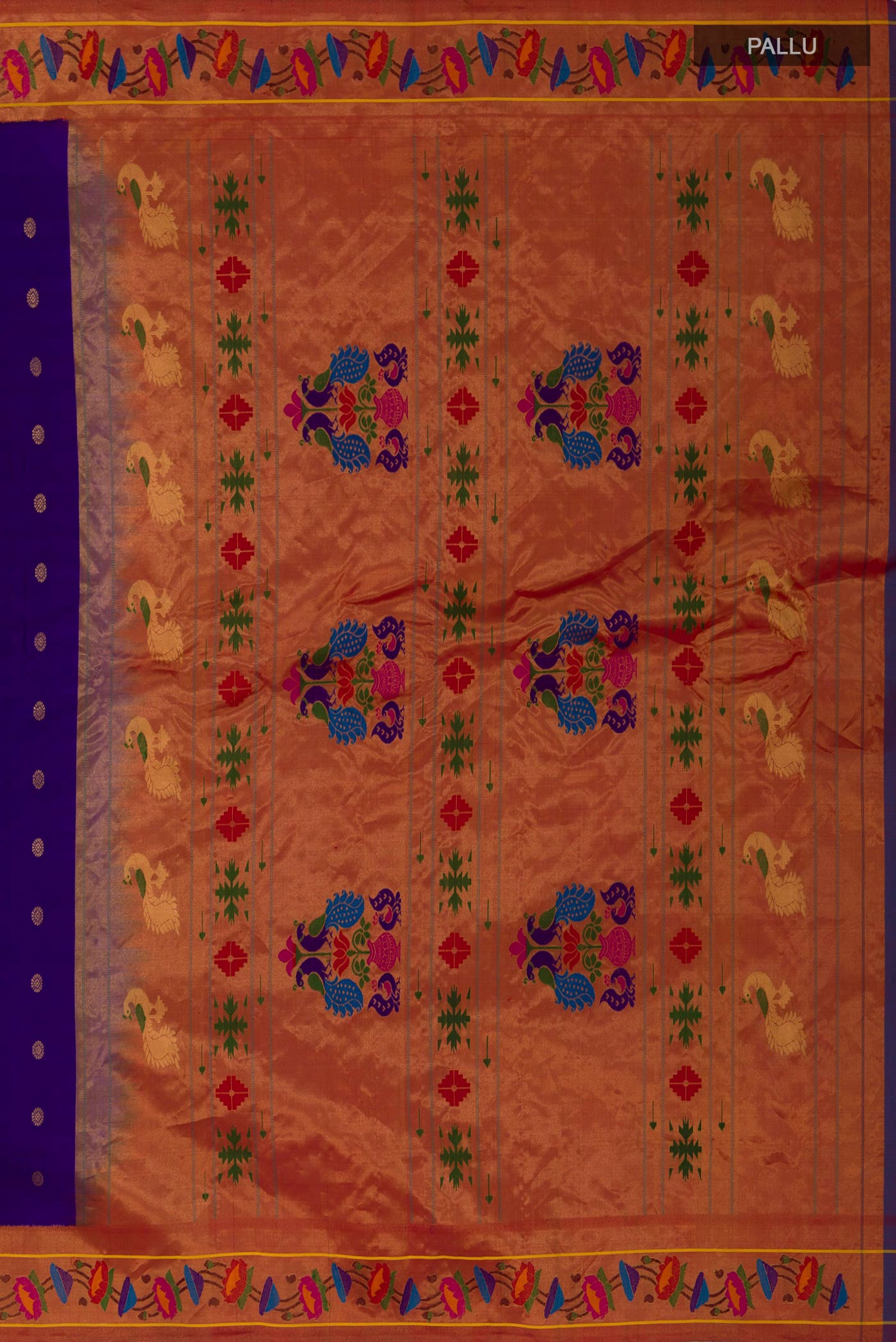 Close up image of the pallu of Blue Gadwal Silk Saree with Zari Butta on the body and Paithani Border. 