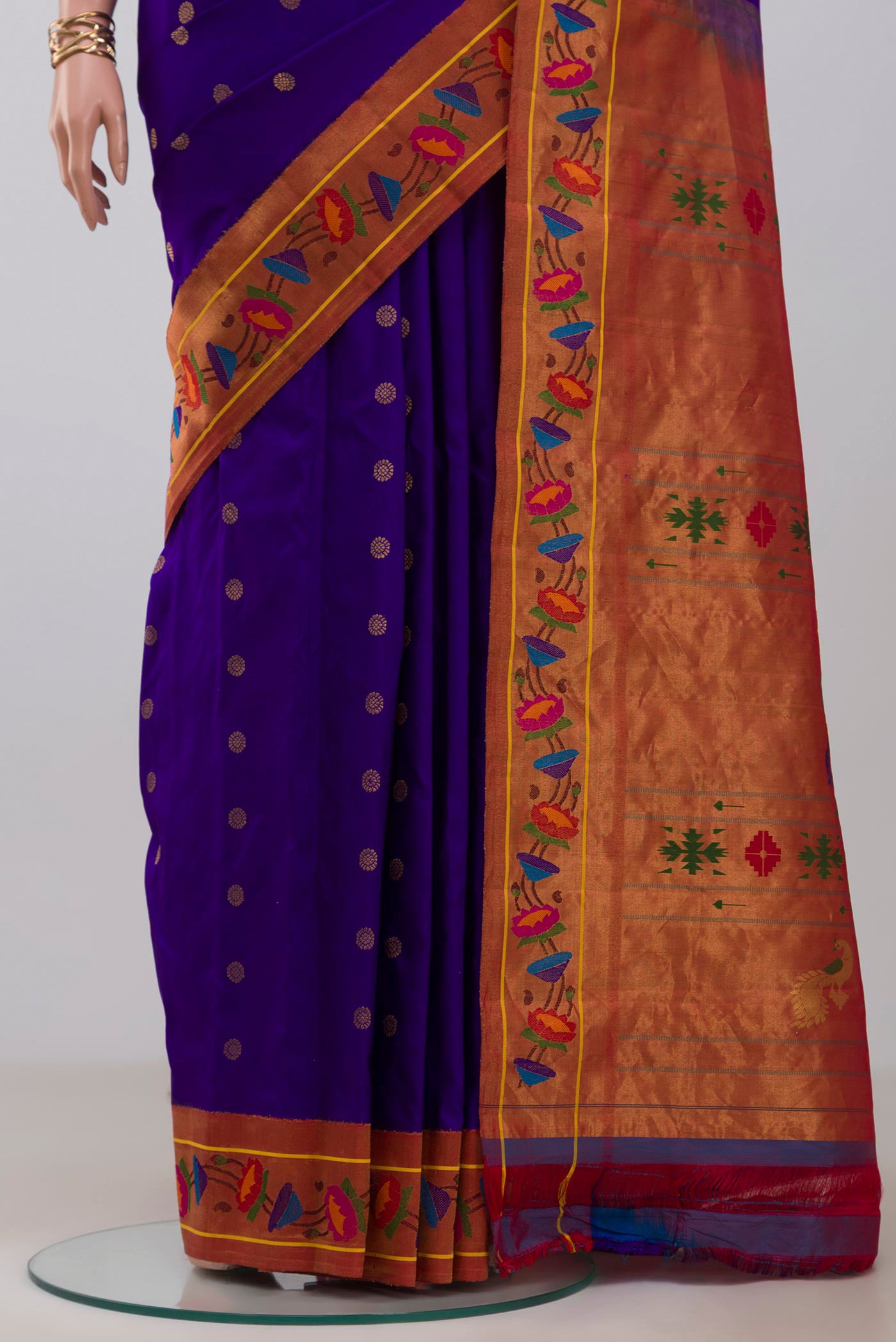 Pleats and pallu of Blue Gadwal Silk Saree with Zari Butta on the body and Paithani Border. 