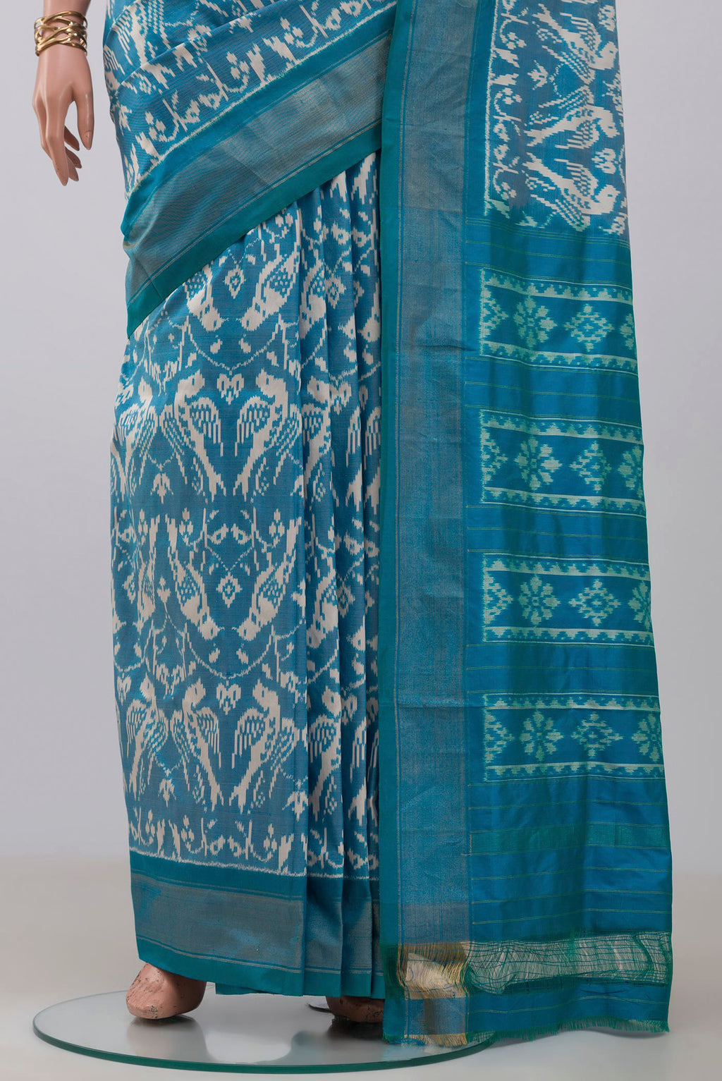 Pleats and pallu of Sky Blue Pochampally Saree with Ikat design on the body and Zari Border. 