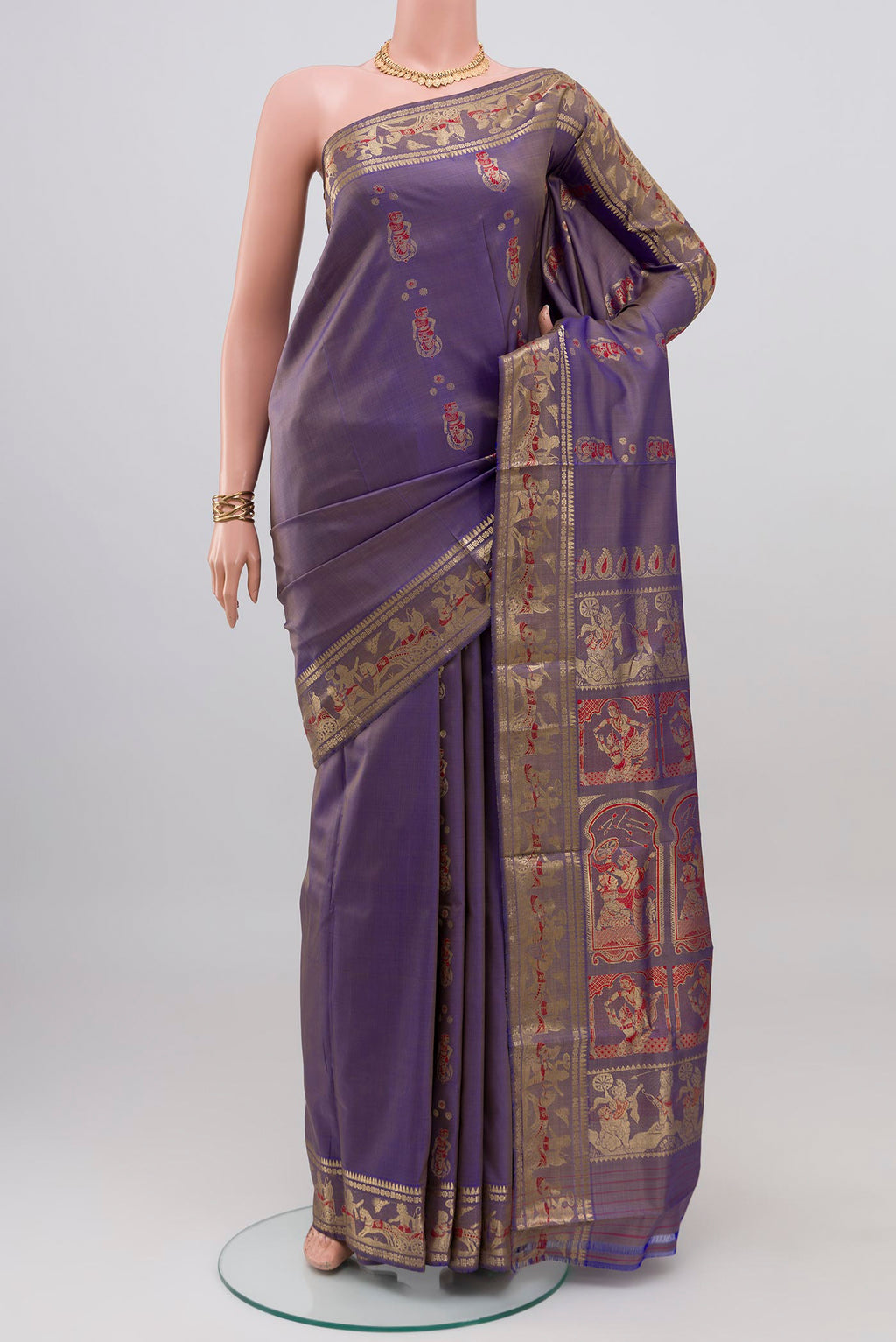 Lavender Baluchari Silk Saree with Zari Butta on the body and Zari Border.  displayed on a mannequin