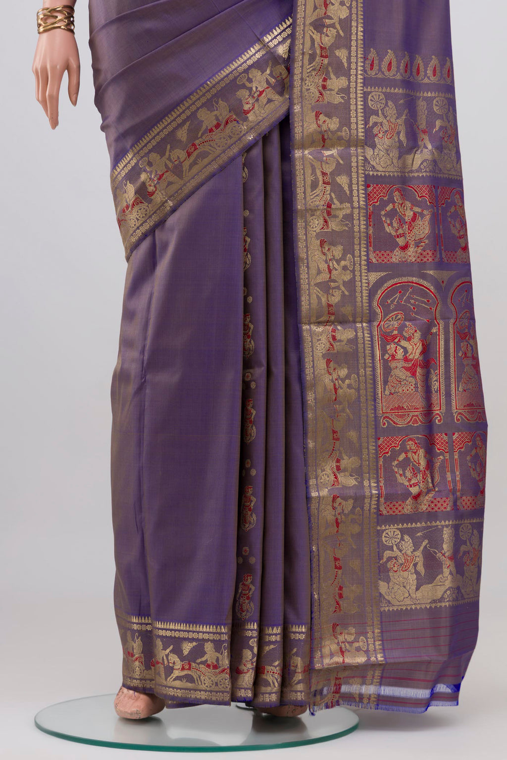 Pleats and pallu of Lavender Baluchari Silk Saree with Zari Butta on the body and Zari Border. 