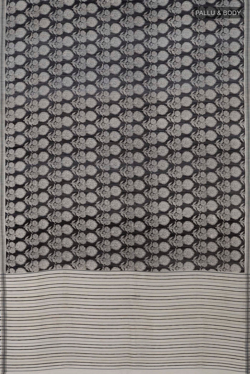 Flat view of Black Tussar Silk Saree with Printed design on the body and Plain Border. 