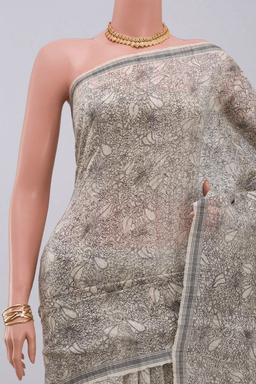 Border image of Cream Jute Silk Saree with Fancy on the body and Plain Border. 