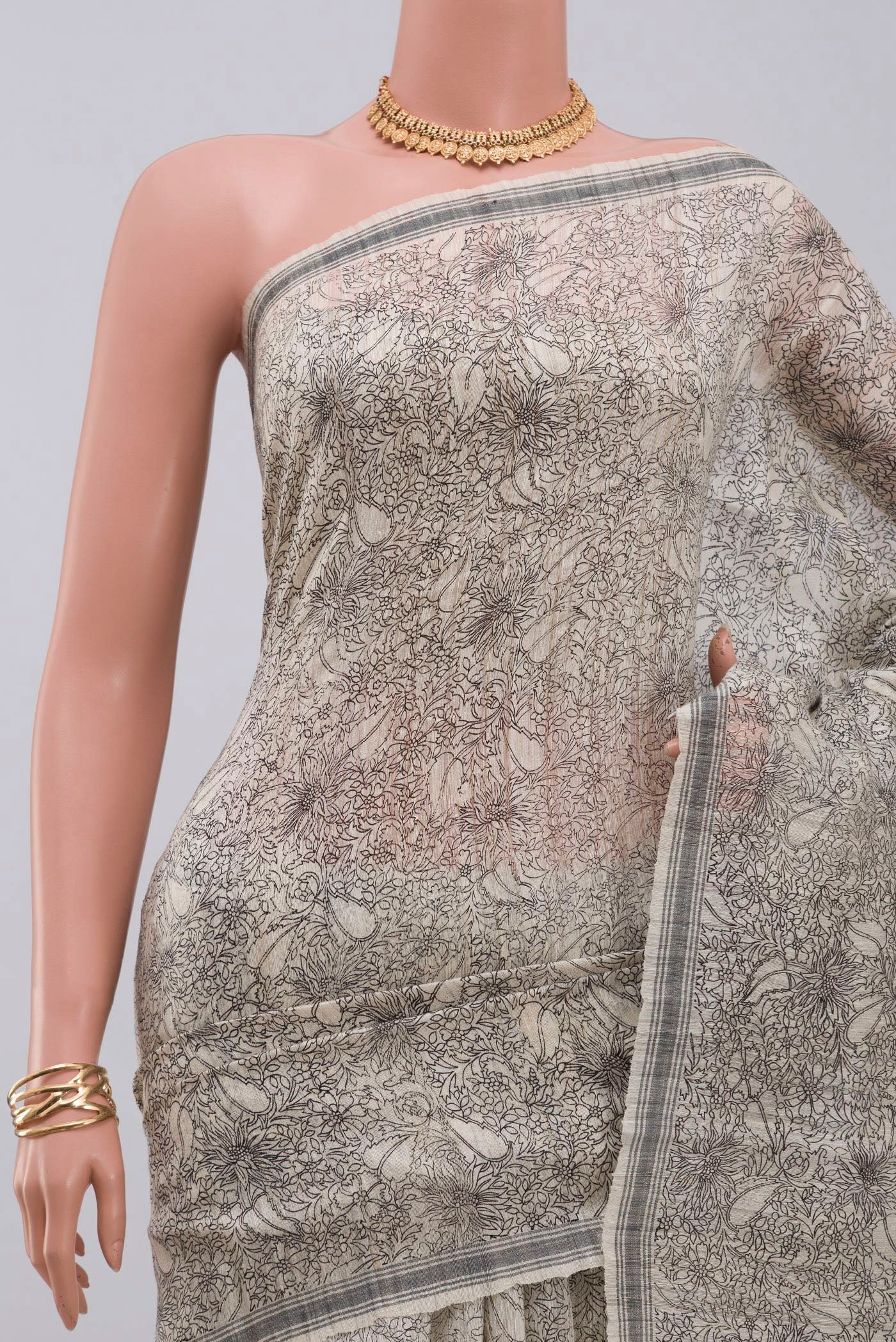 Border image of Cream Jute Silk Saree with Fancy on the body and Plain Border. 