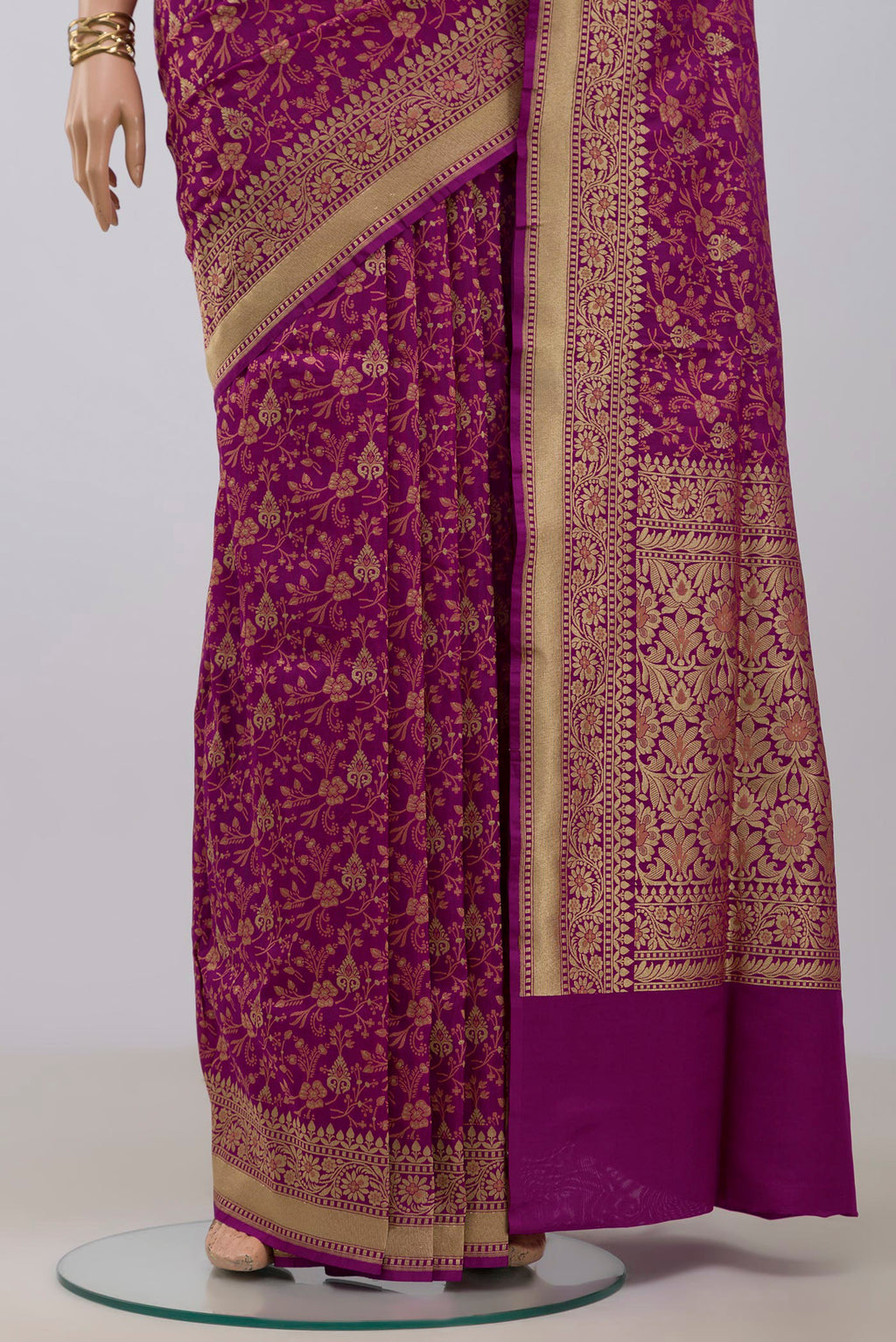 Pleats and pallu of Magenta Banarasi Saree with Fancy on the body and Fancy Border. 