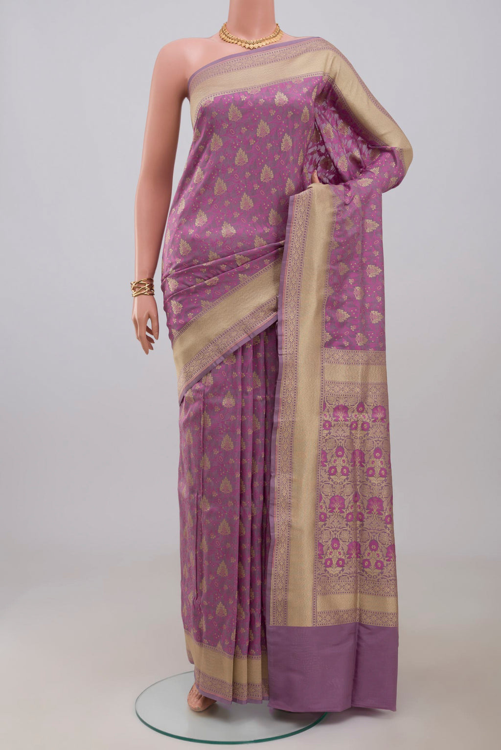 Lavender Banarasi Saree with Fancy on the body and Fancy Border.  displayed on a mannequin