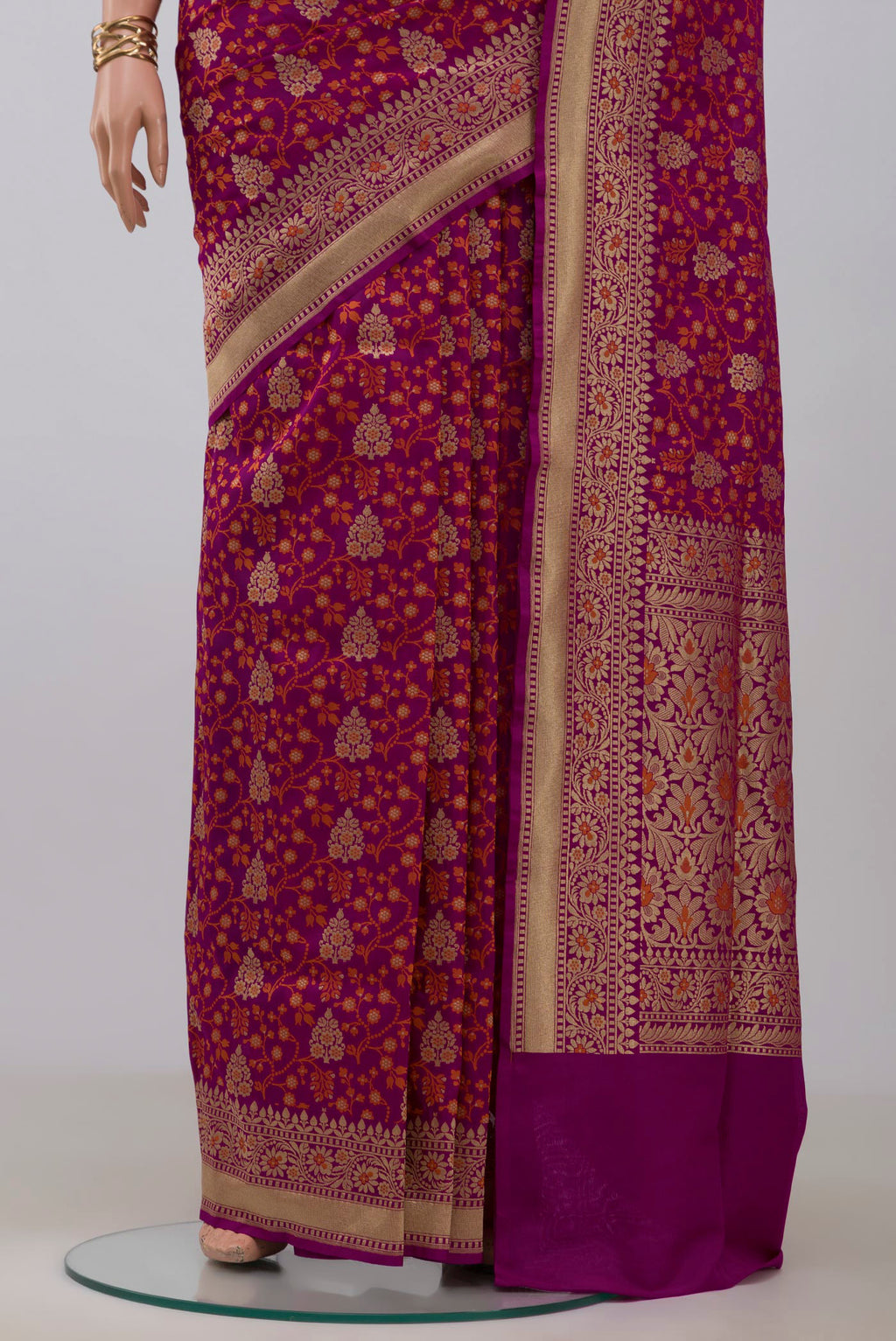 Pleats and pallu of Magenta Banarasi Saree with Fancy on the body and Fancy Border. 