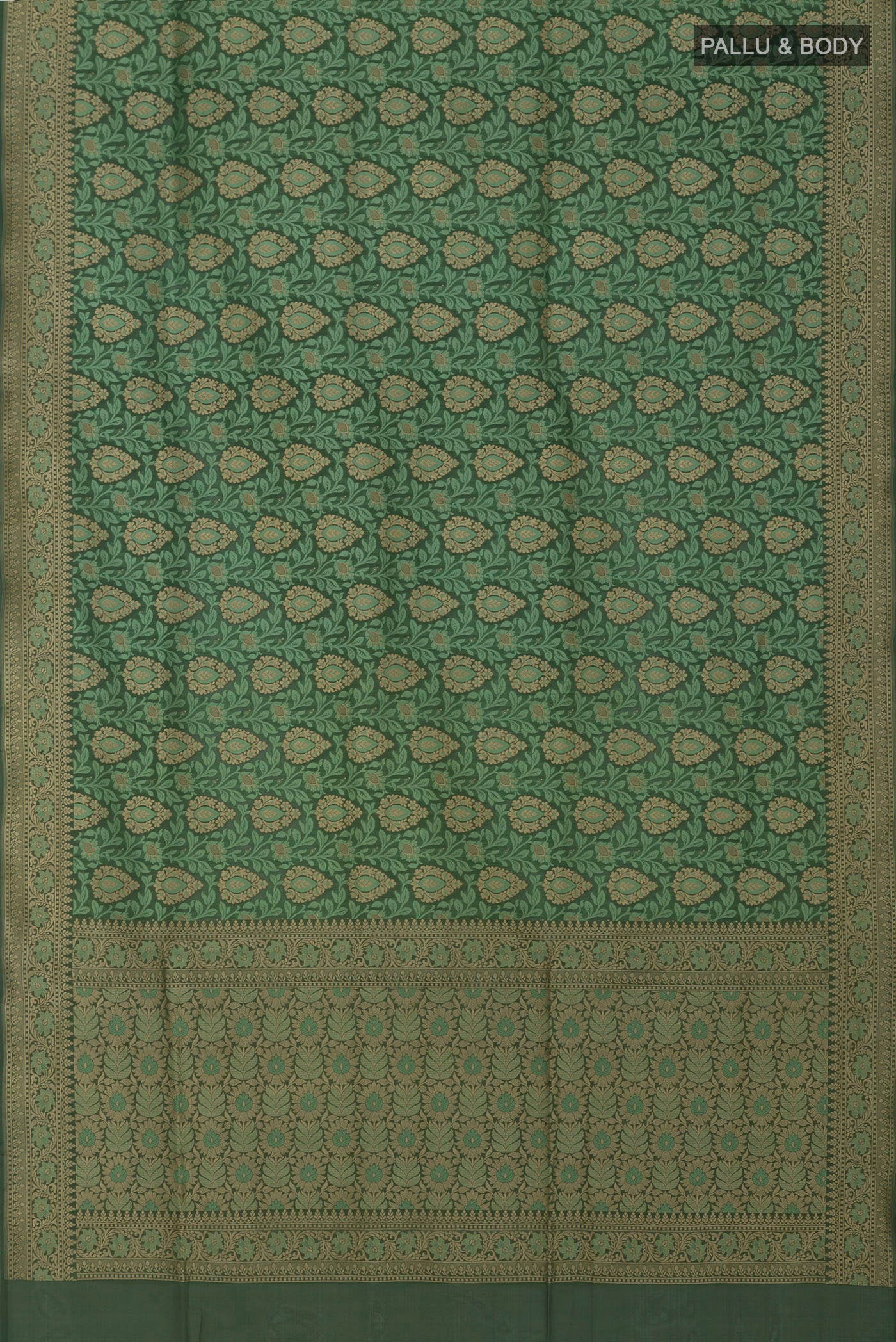 Flat view of Green Banarasi Silk Saree with Jacquard With Zari Butta on the body and Fancy Border. 