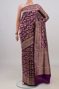 Pure Silk Purple Banarasi Saree with Zari Brocade on the body and Zari Border.  displayed on a mannequin