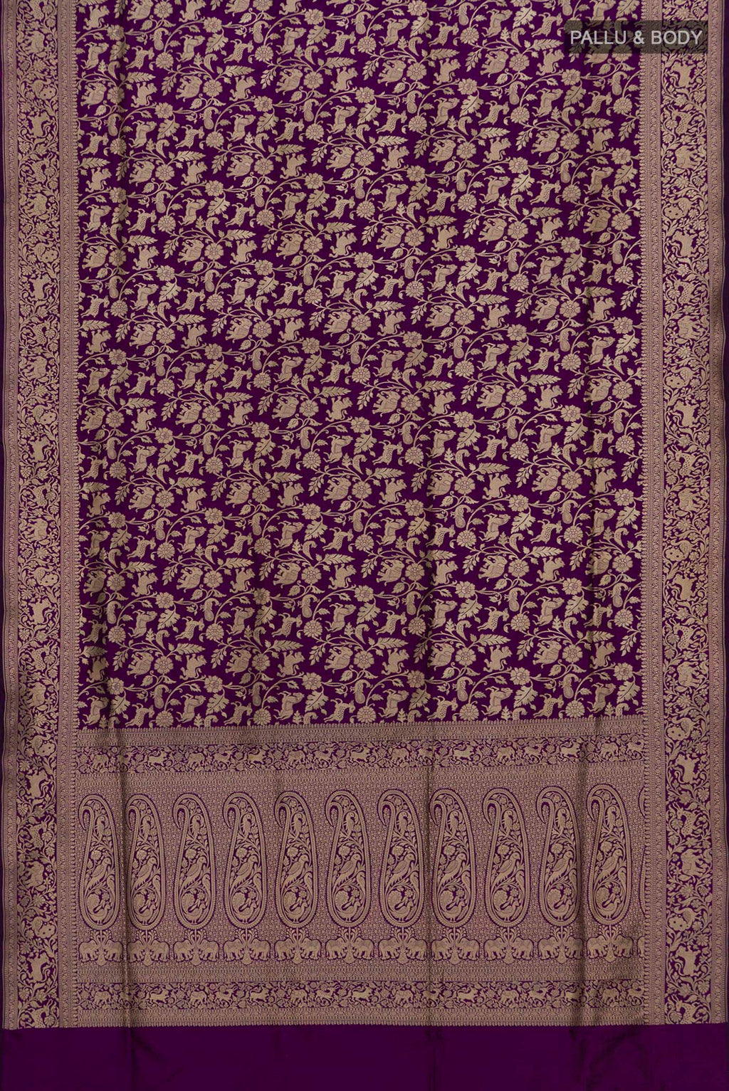 Flat view of Pure Silk Purple Banarasi Saree with Zari Brocade on the body and Zari Border. 
