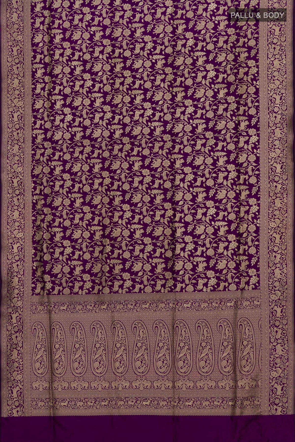 Flat view of Pure Silk Purple Banarasi Saree with Zari Brocade on the body and Zari Border. 