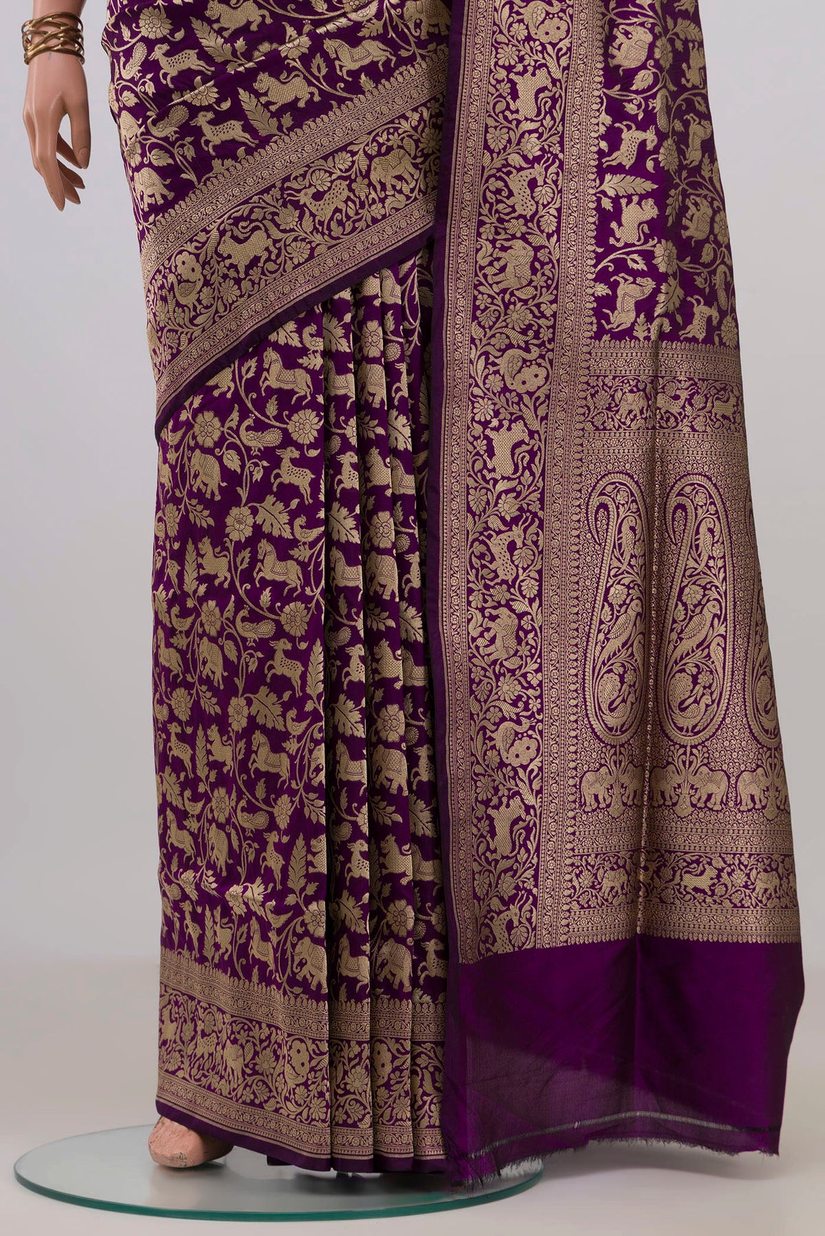 Pleats and pallu of Pure Silk Purple Banarasi Saree with Zari Brocade on the body and Zari Border. 