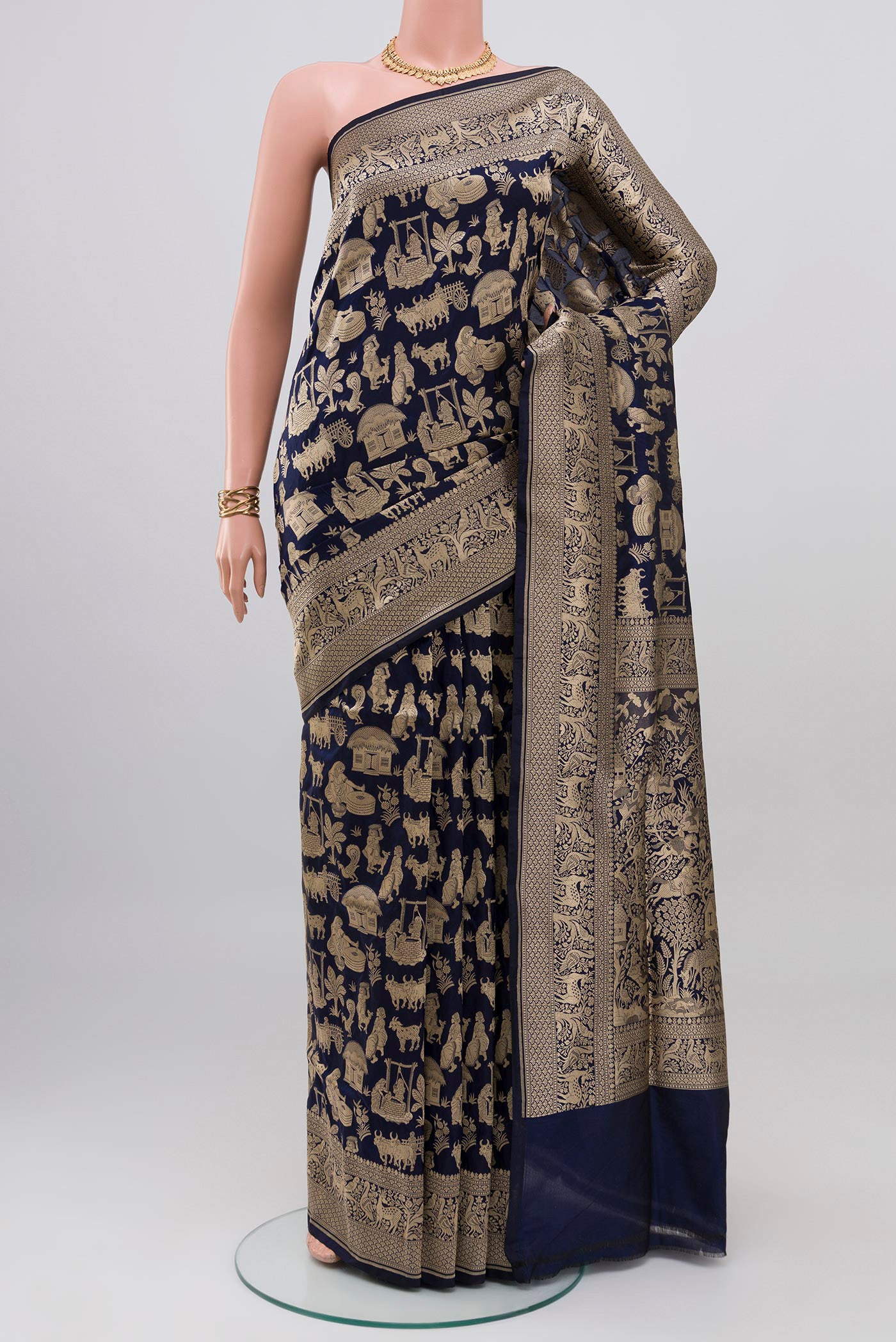 Navy Blue Banarasi Saree with Zari Brocade on the body and Fancy Border.  displayed on a mannequin